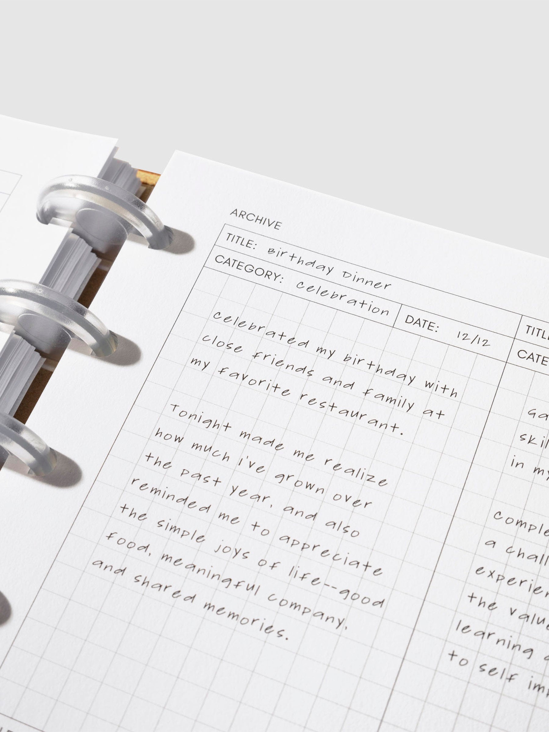 Closeup of inserts inside a leather planner.