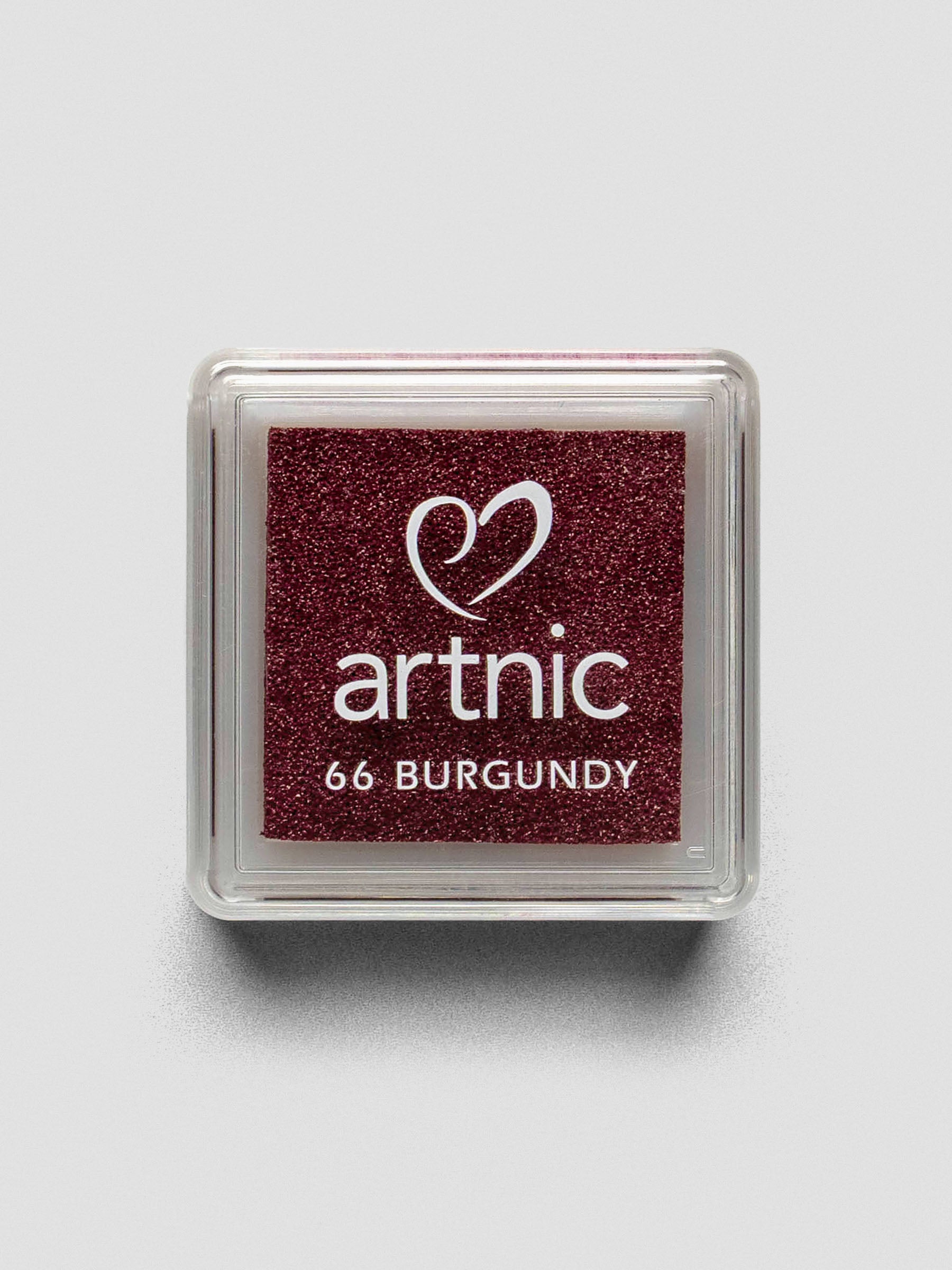 Square burgundy Artnic ink pad with clear lid labeled “66 Burgundy,” viewed from above.