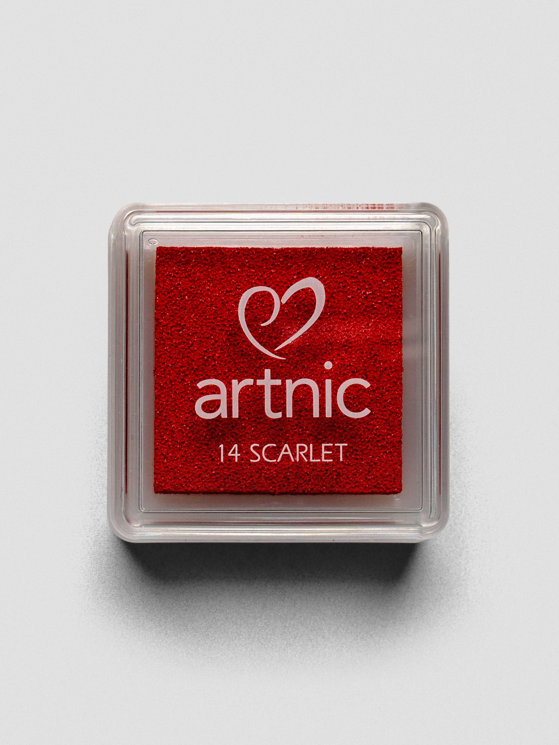 Square red Artnic ink pad with clear lid labeled “14 Scarlet,” viewed from above.