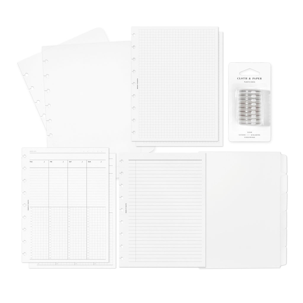 Cloth and Paper's HP Classic-sized Beginner Planner Bundle components artfully showcased against a white backdrop, featuring a clear vinyl planner, blank side tab planner dividers, weekly schedule inserts, task planner inserts, and graph planner inserts.