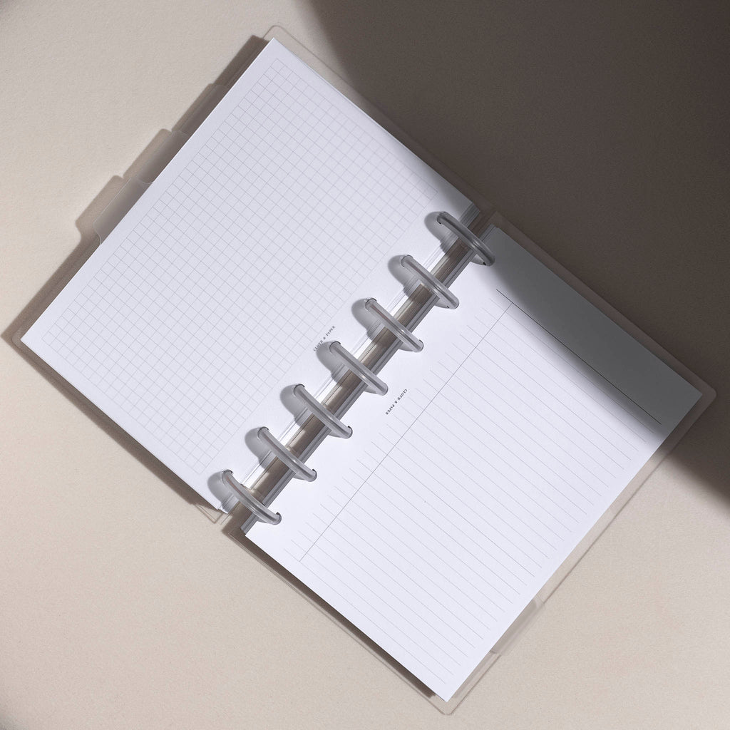 HP MINI-sized Beginner Planner Bundle opened to showcase Task inserts, with a stylish presentation on a white background accompanied by subtle shadows.