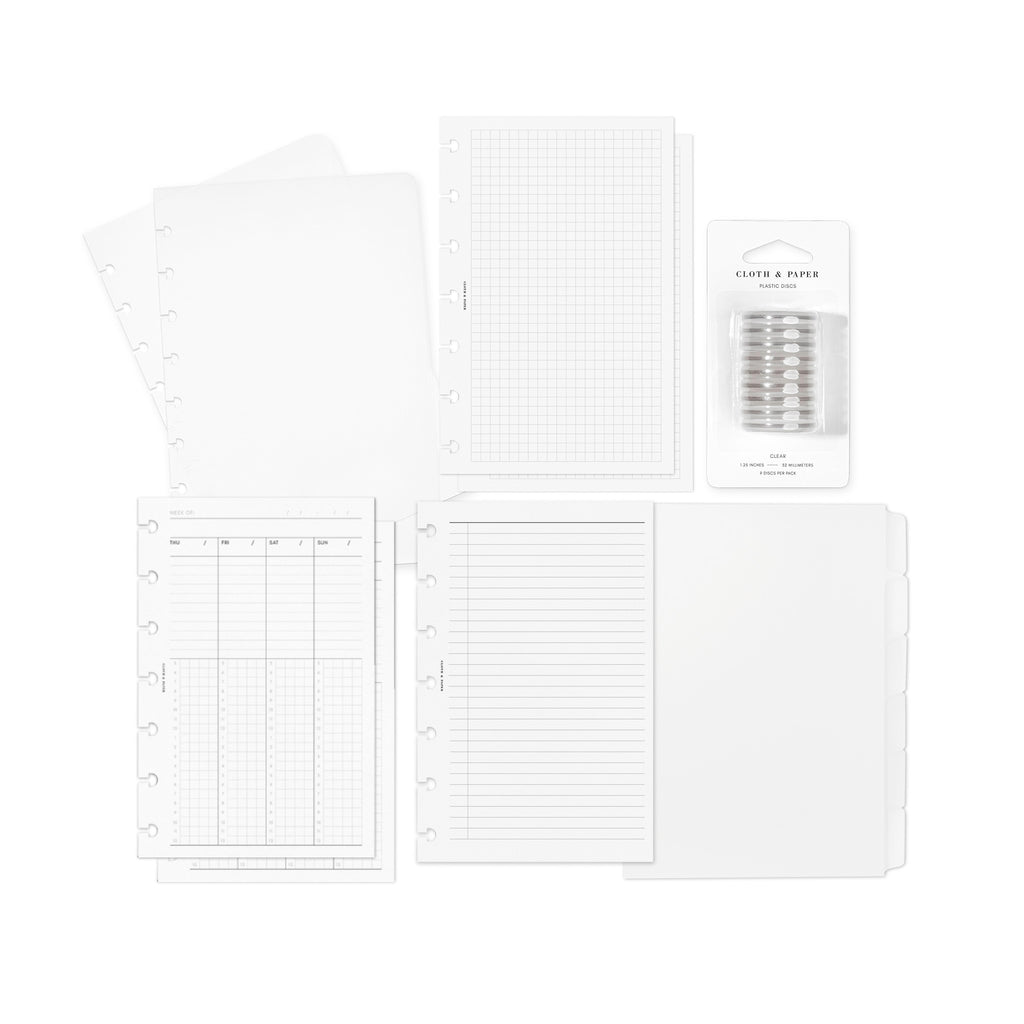Cloth and Paper's HP MINI-sized Beginner Planner Bundle components elegantly presented on a white background, featuring a clear vinyl planner, blank side tab planner dividers, weekly schedule inserts, task planner inserts, and graph planner inserts.