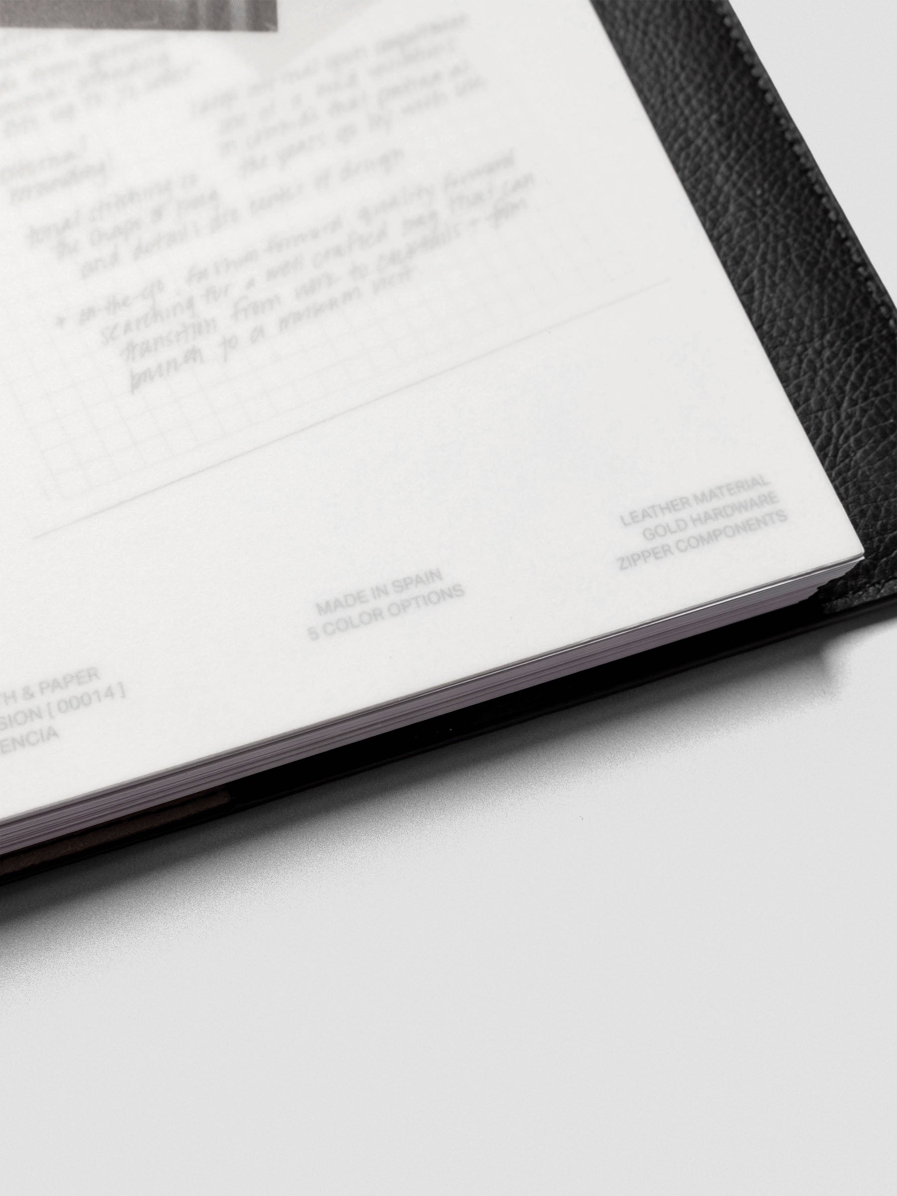 Detail of a half-letter Behind the Scenes Dashboard Duo insert showing handwritten notes beneath a translucent vellum overlay with a photograph and sticky note accent.