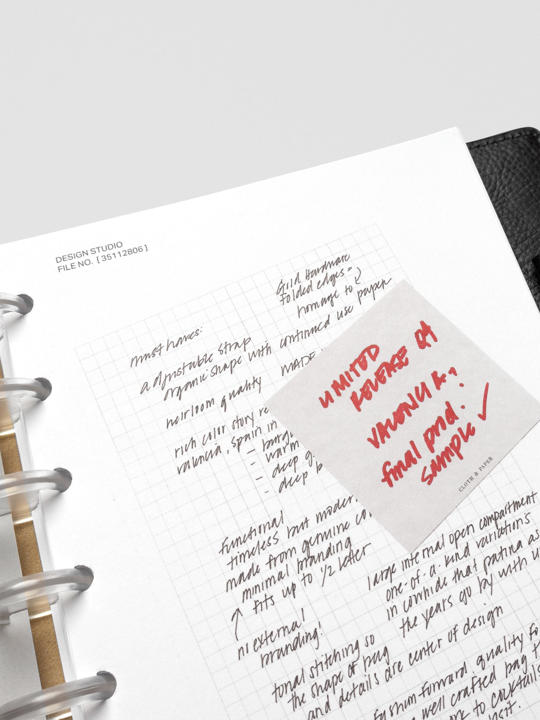 Close-up of handwritten notes on a half-letter Behind the Scenes Dashboard Duo insert, with a grey sticky note marked in red ink reading ‘Limited Release Valencia Final Prod Sample.’