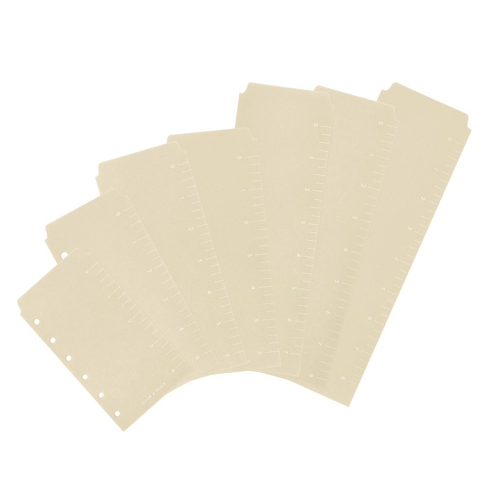 All sizes of the Beignet Plastic Page Marker displayed together on a white background.