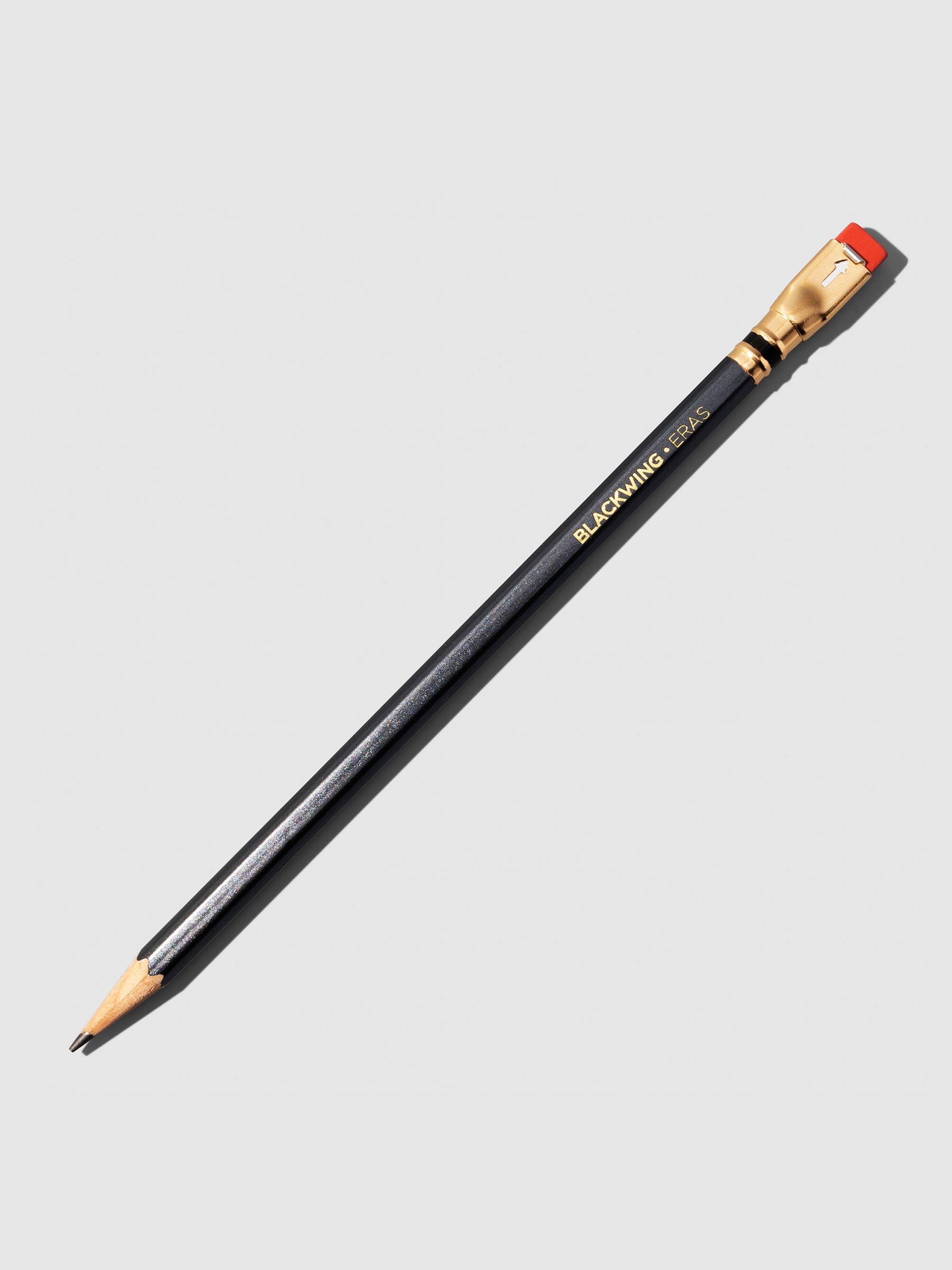 Black wooden pencil displayed on a neutral background.