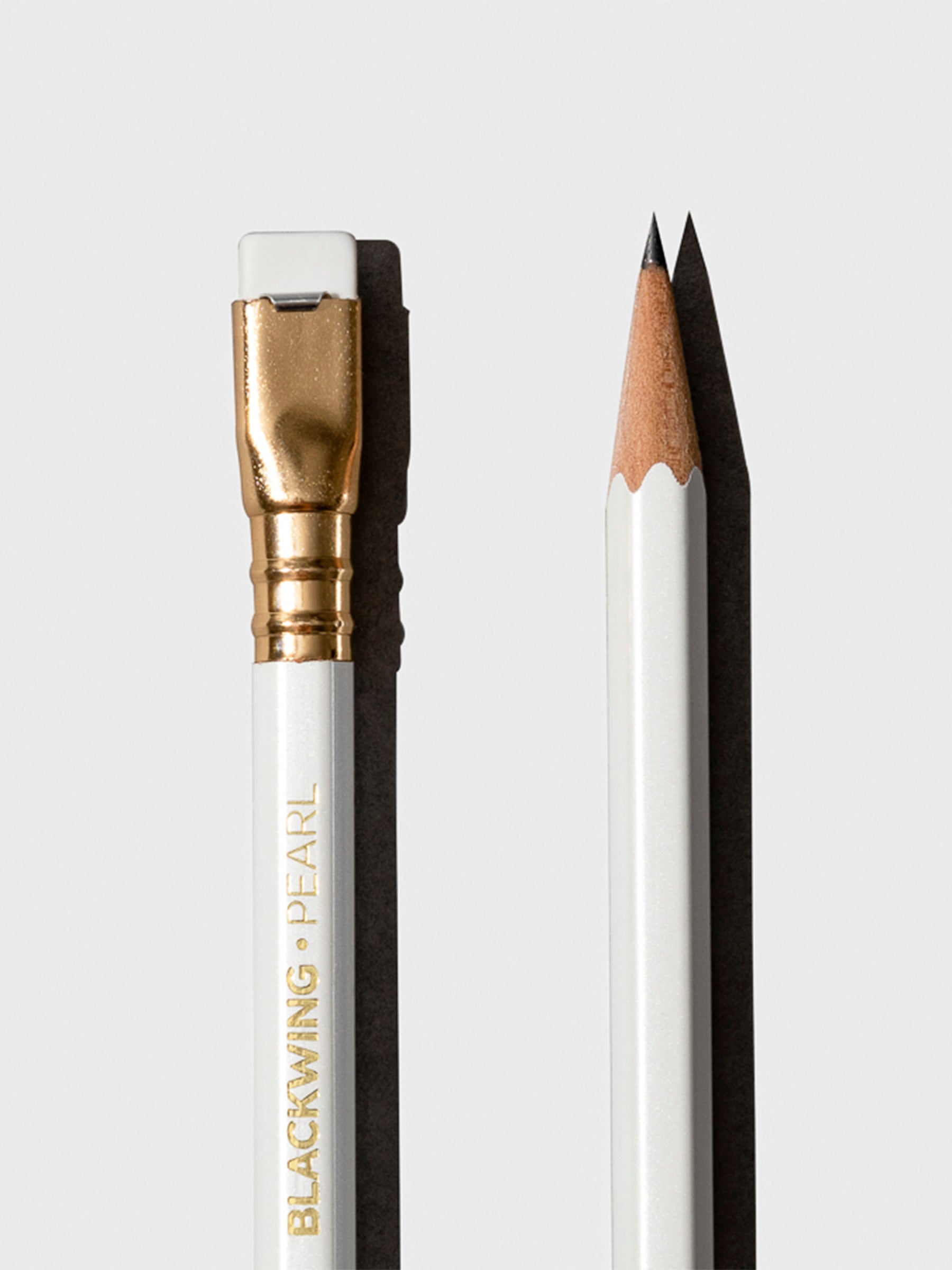 From left to right, the image shows a close-up of the tapered eraser next to a sharpened pencil tip.