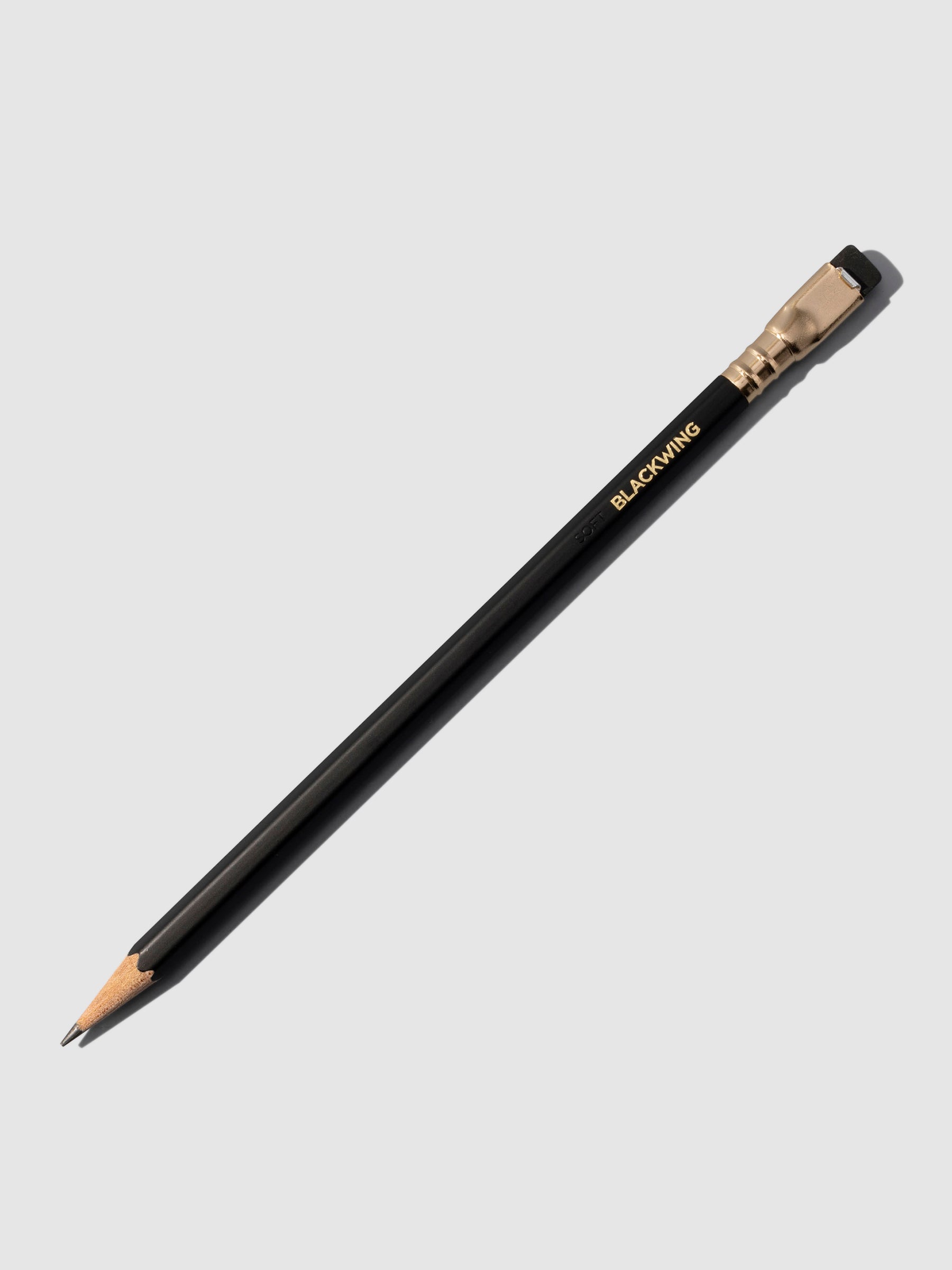 Gray wooden pencil displayed on a neutral background.