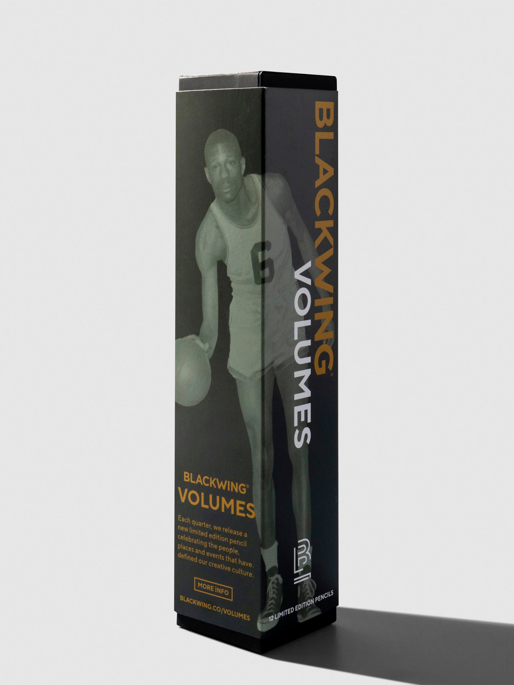 Pencil packaging displayed on a neutral background. It features a grayscale photo of Bill Russel in his basketball uniform, dribbling a basketball.