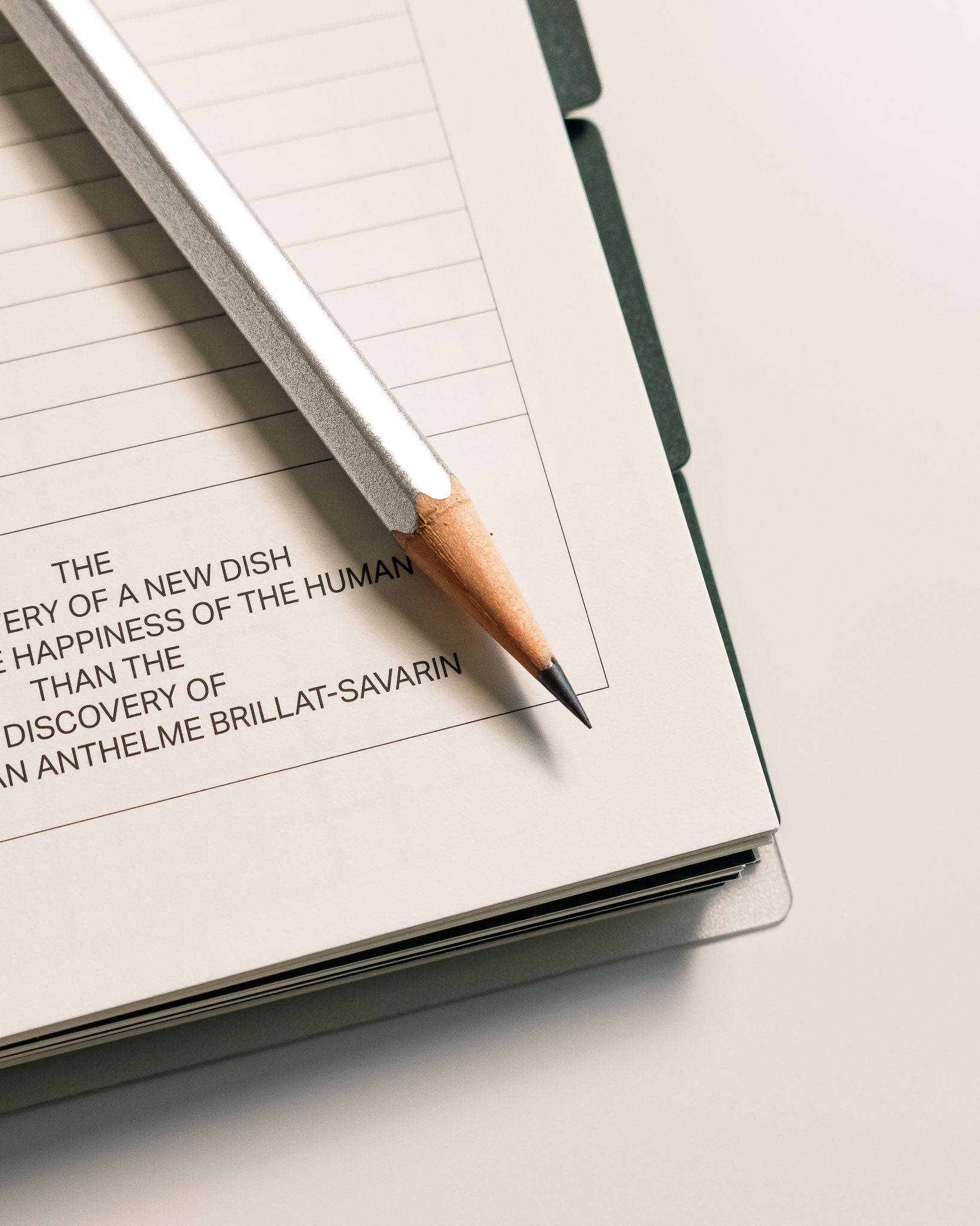 Close-up of a Blackwing 140 pencil on a planner page.