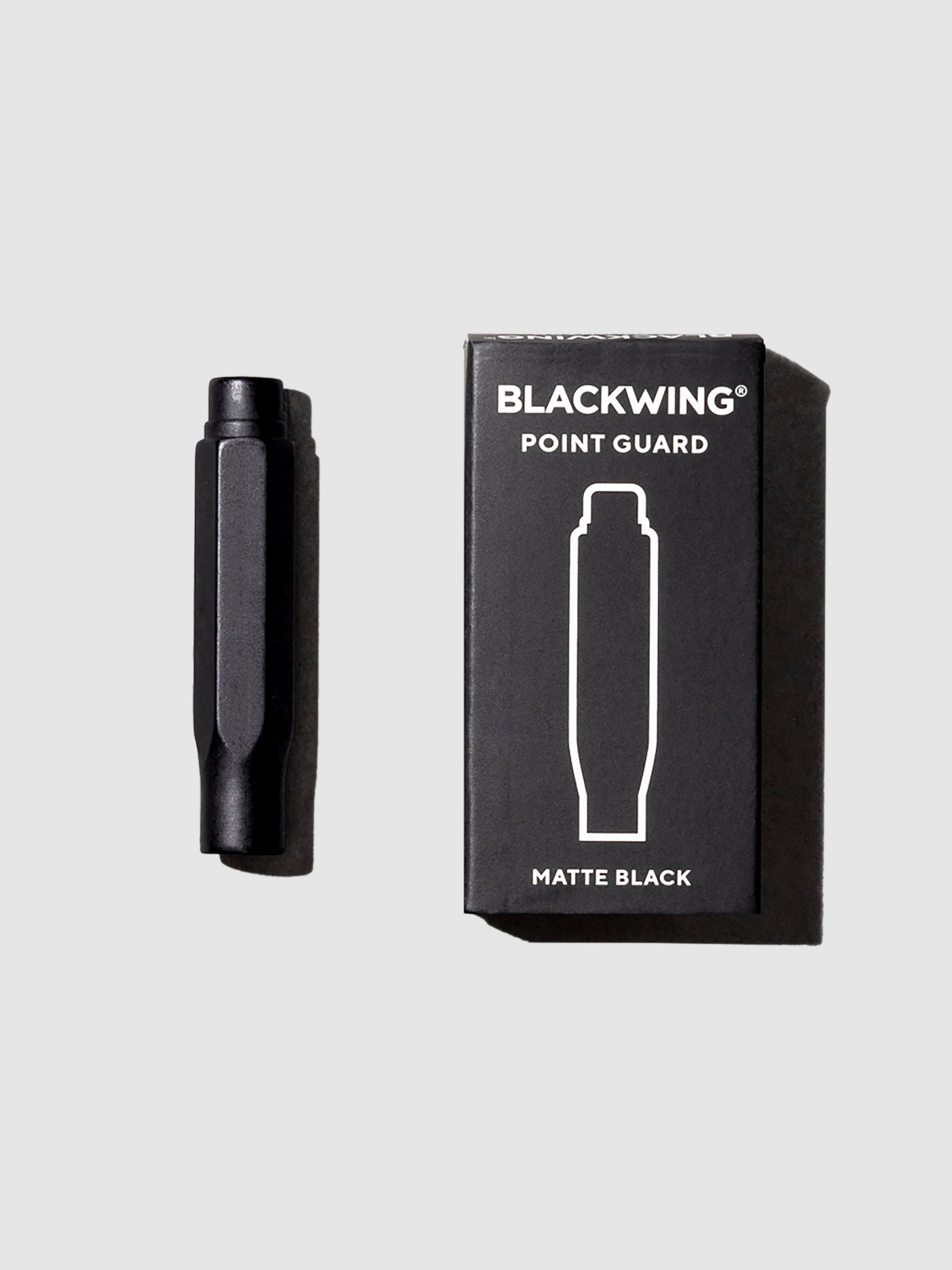 From left to right, the image shows the blackwing point guard in matte black next to its box.