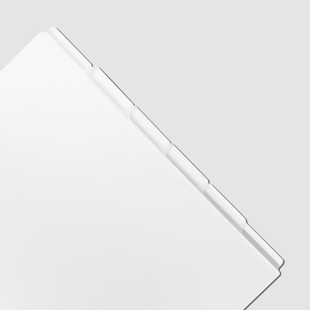 Closeup of Personal Wide blank divider tabs on a white background.