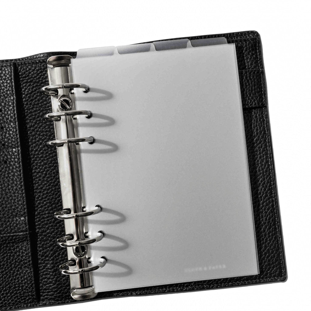 Personal Wide Dividers in use inside a black leather planner.