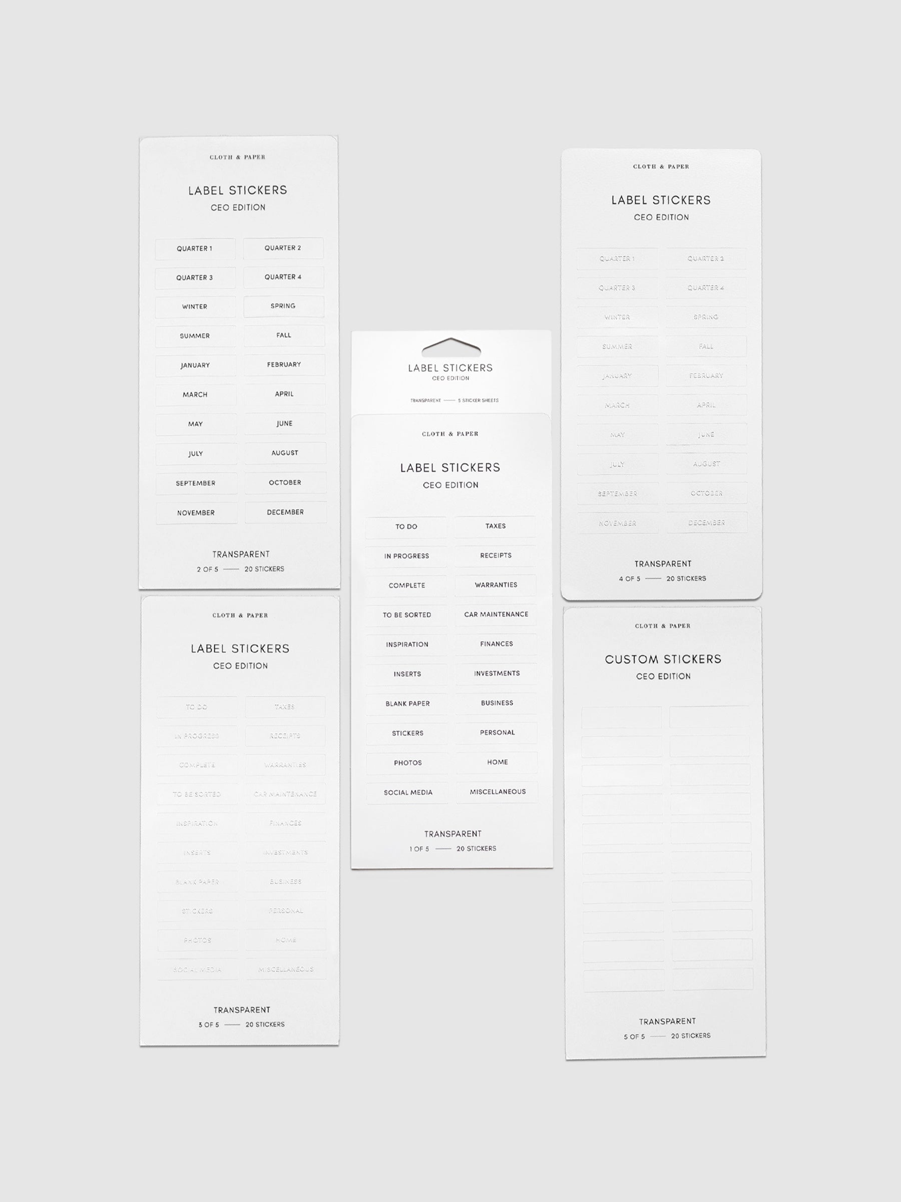 CEO Label Stickers, Cloth and Paper. 5 sheets of stickers arranged together on a neutral background.
