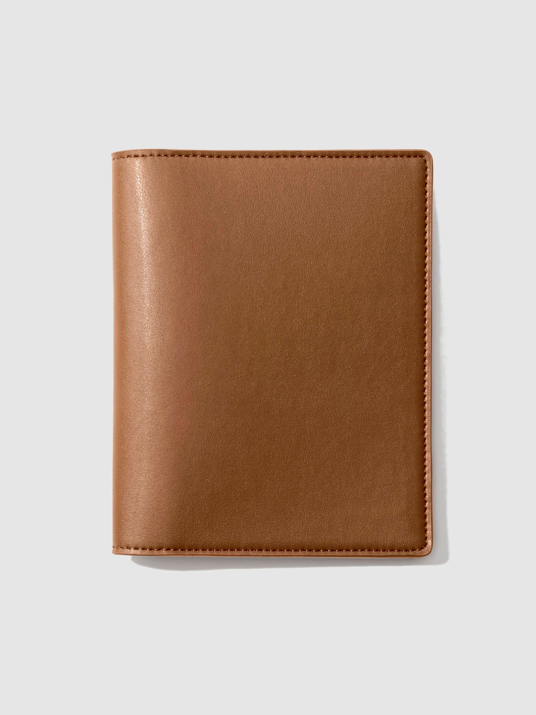 CP Petite folio displayed on a neutral background. Color shown is clay brown. 
