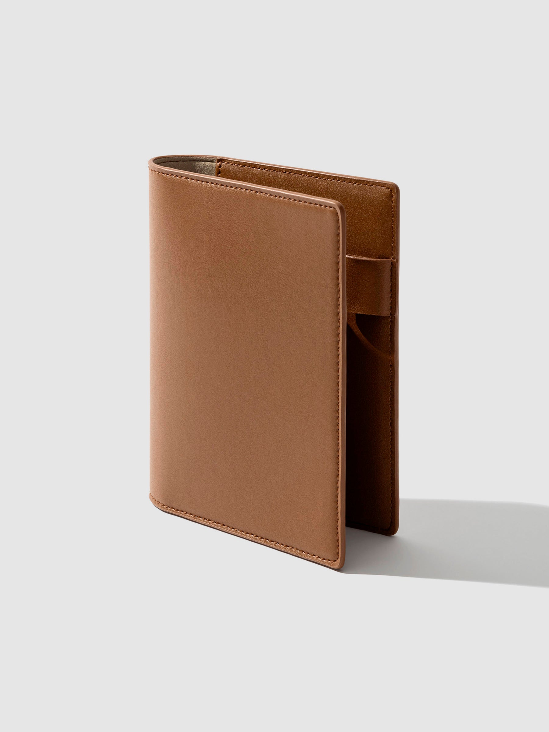 CP Petite folio displayed at a three quarter angle on a neutral background. Color shown is clay brown. 