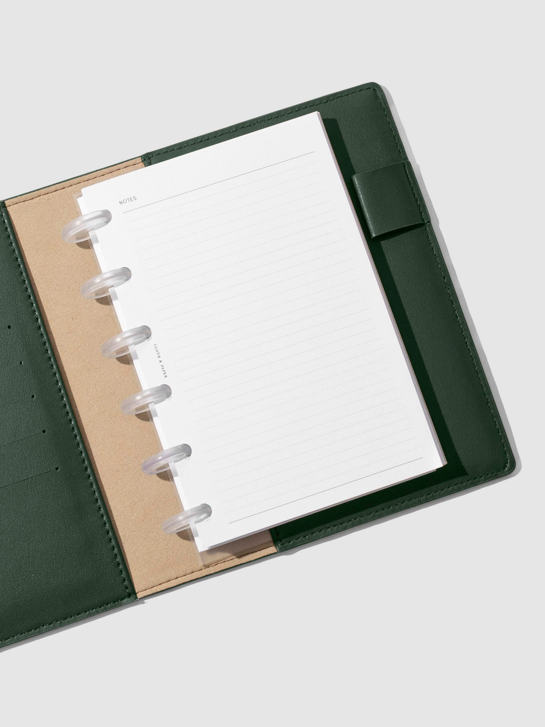CP Petite folio displayed opened on a neutral background. Color shown is valley green. 