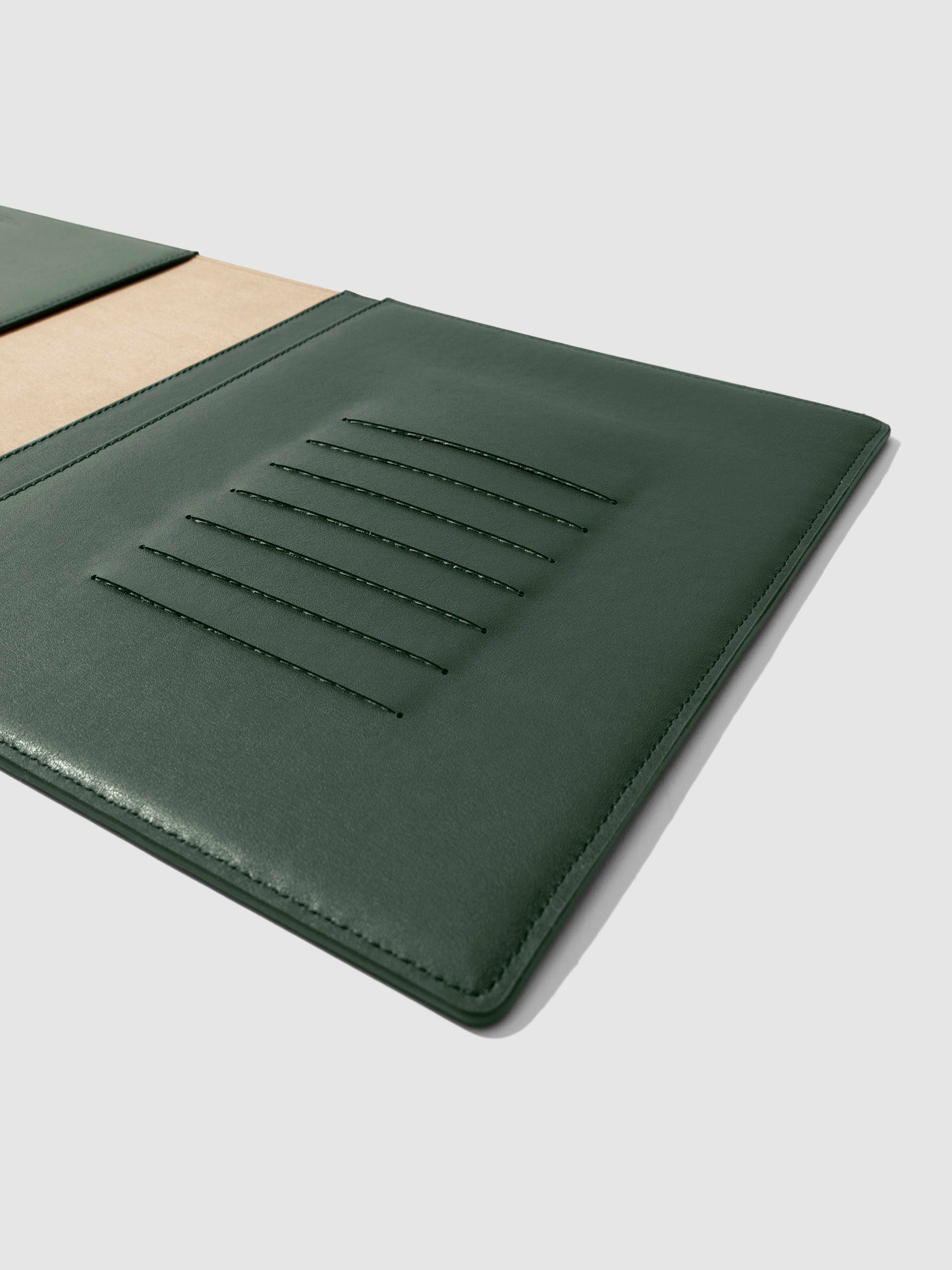 Closeup of folio's credit card slots. Color pictured is valley green.
