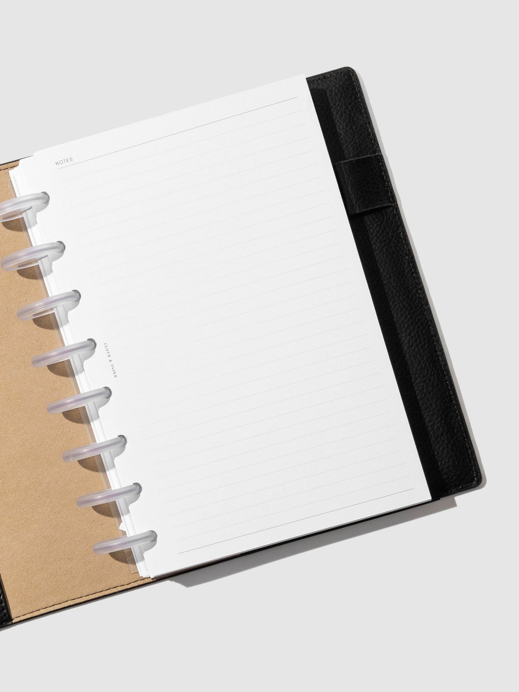 Folio displayed opened on a neutral background. Color shown is mesa black.