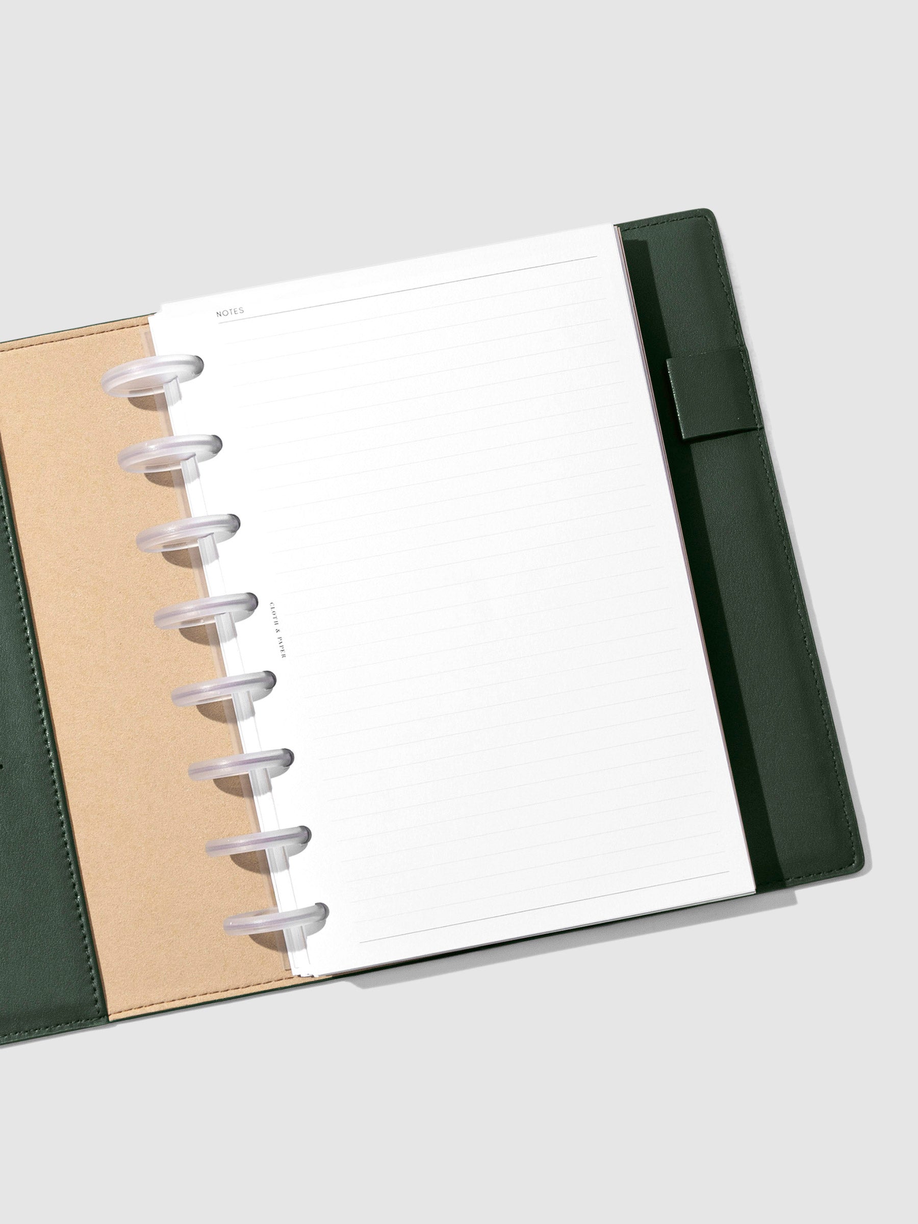 Folio displayed opened on a neutral background. Color shown is valley green. 