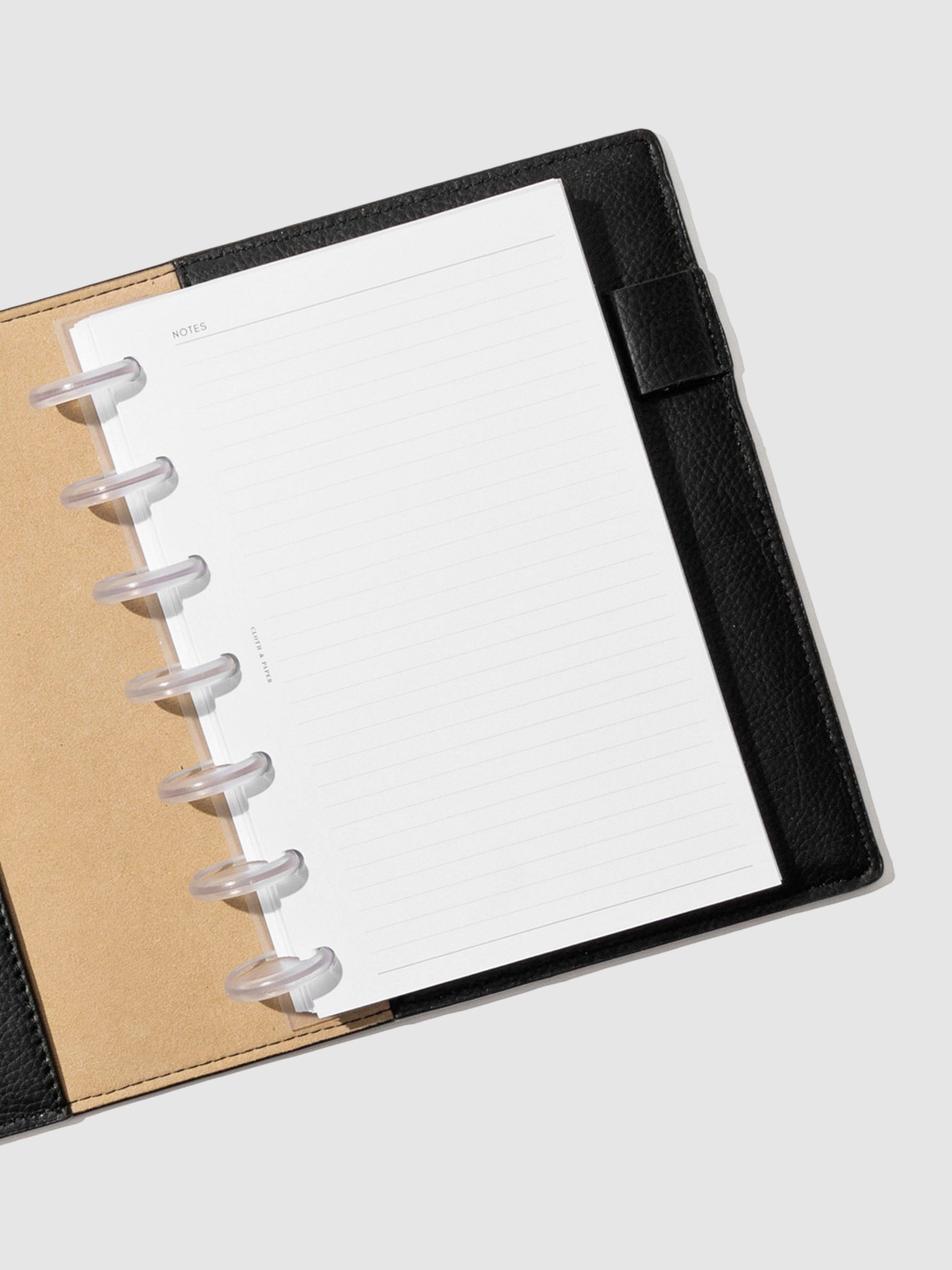 Folio displayed opened on a neutral background. Color shown is mesa black.