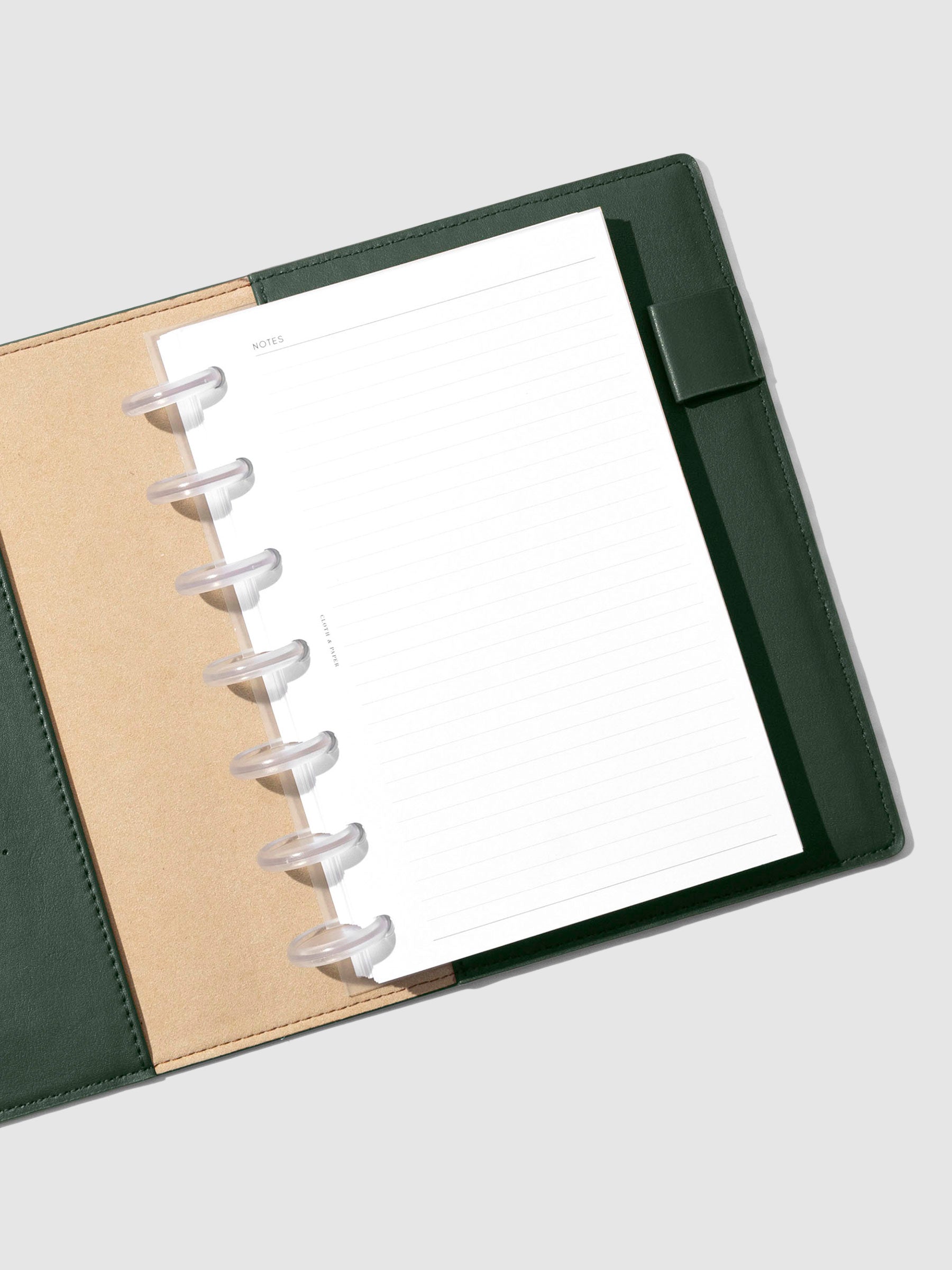 Folio displayed opened on a neutral background. Color shown is valley green. 