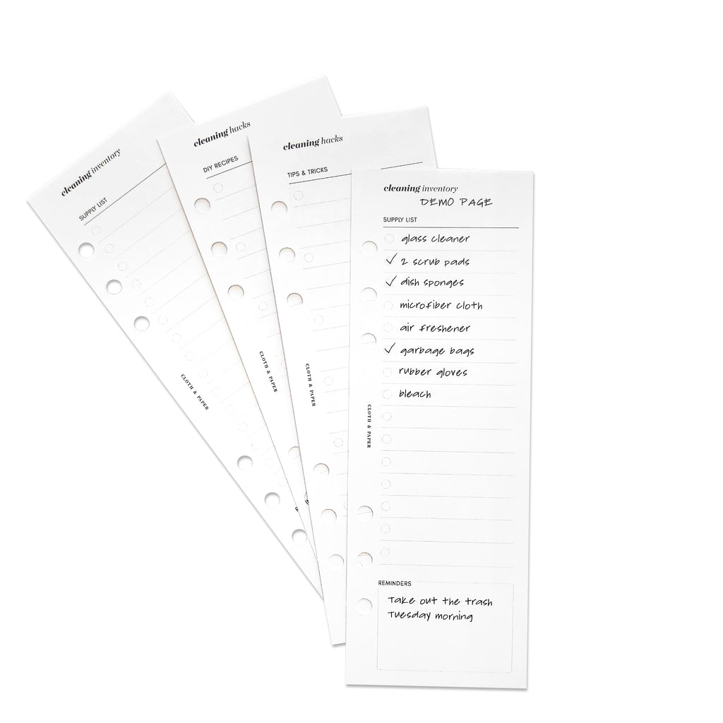 Inserts displayed on a white background. A demo page that is filled out rests on the top of the arrangement of inserts.