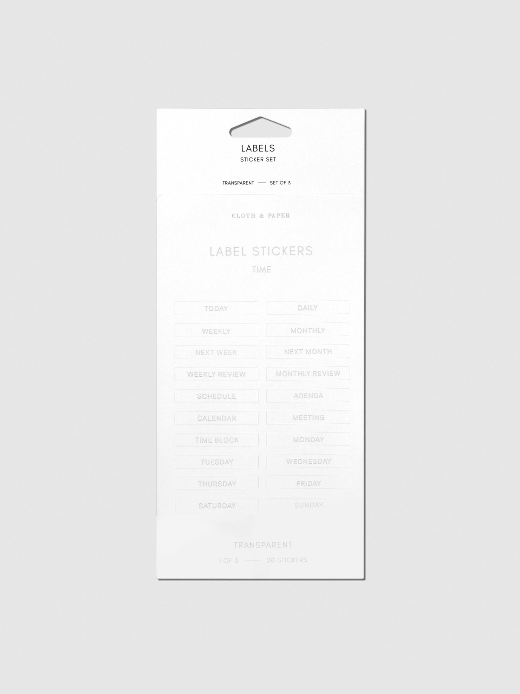 Label stickers in their packaging. The text on each sticker is silver.