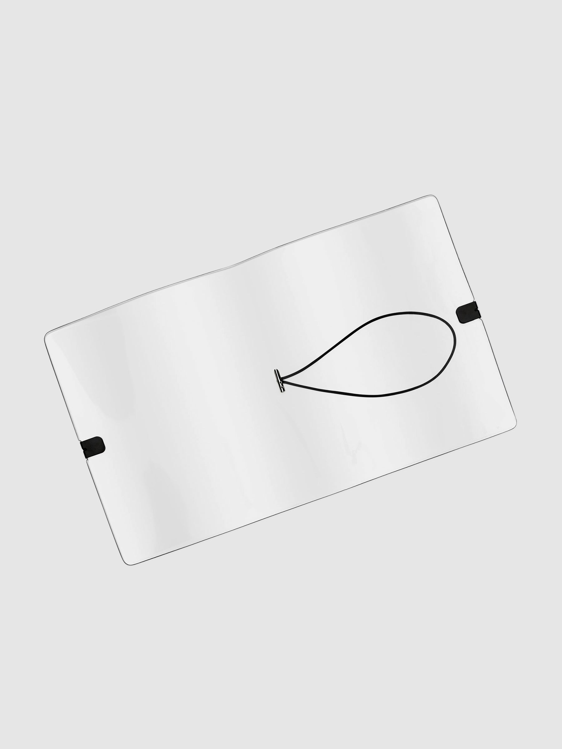 Clear vinyl cover opened and empty displayed on a neutral background.