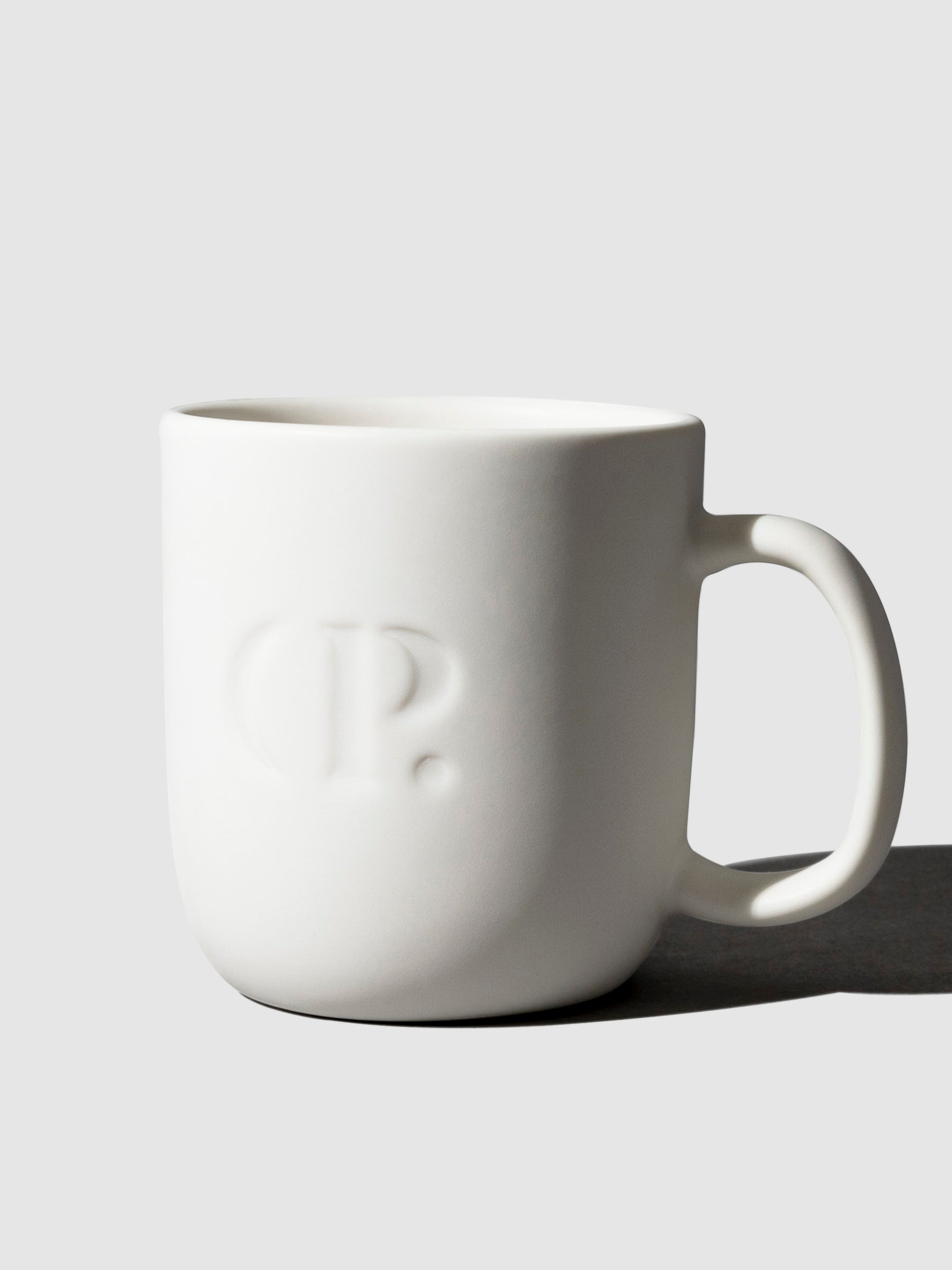 Cloth and Paper Mug, Cloth and Paper. Mug shown on a neutral background.