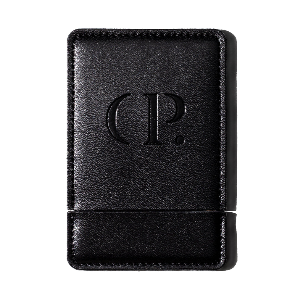 Aesthete Lifestyle Collection Compact Mirror, Cloth and Paper. Compact mirror with cover attached. The Cloth and Paper CP logo is embossed into the leather material of the cover.