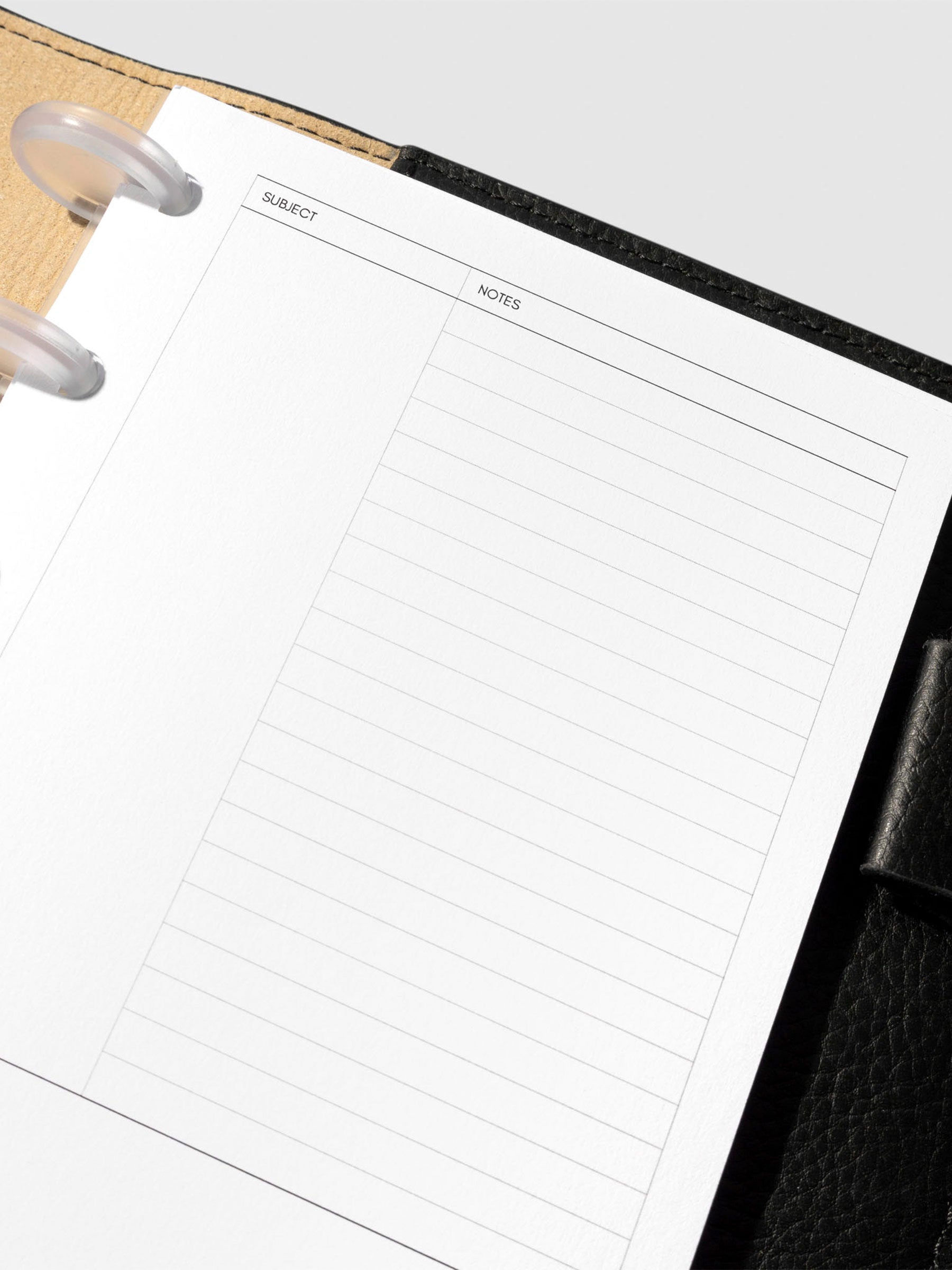 Insert in use inside a black leather folio.