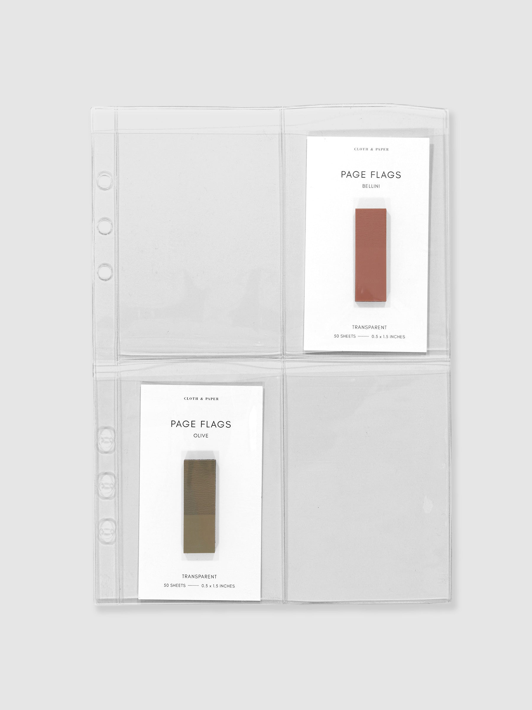 Card holder displayed on a neutral background. Two sets of page flags are displayed in two of the pockets. Size shown is Half Letter.