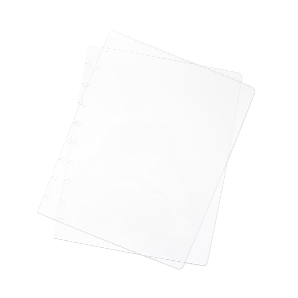 Crystal Clear Discbound Notebook Cover, HP Classic, Cloth and Paper. Two transparent notebook covers laid on top of one another with the top cover tilted slightly to the right.