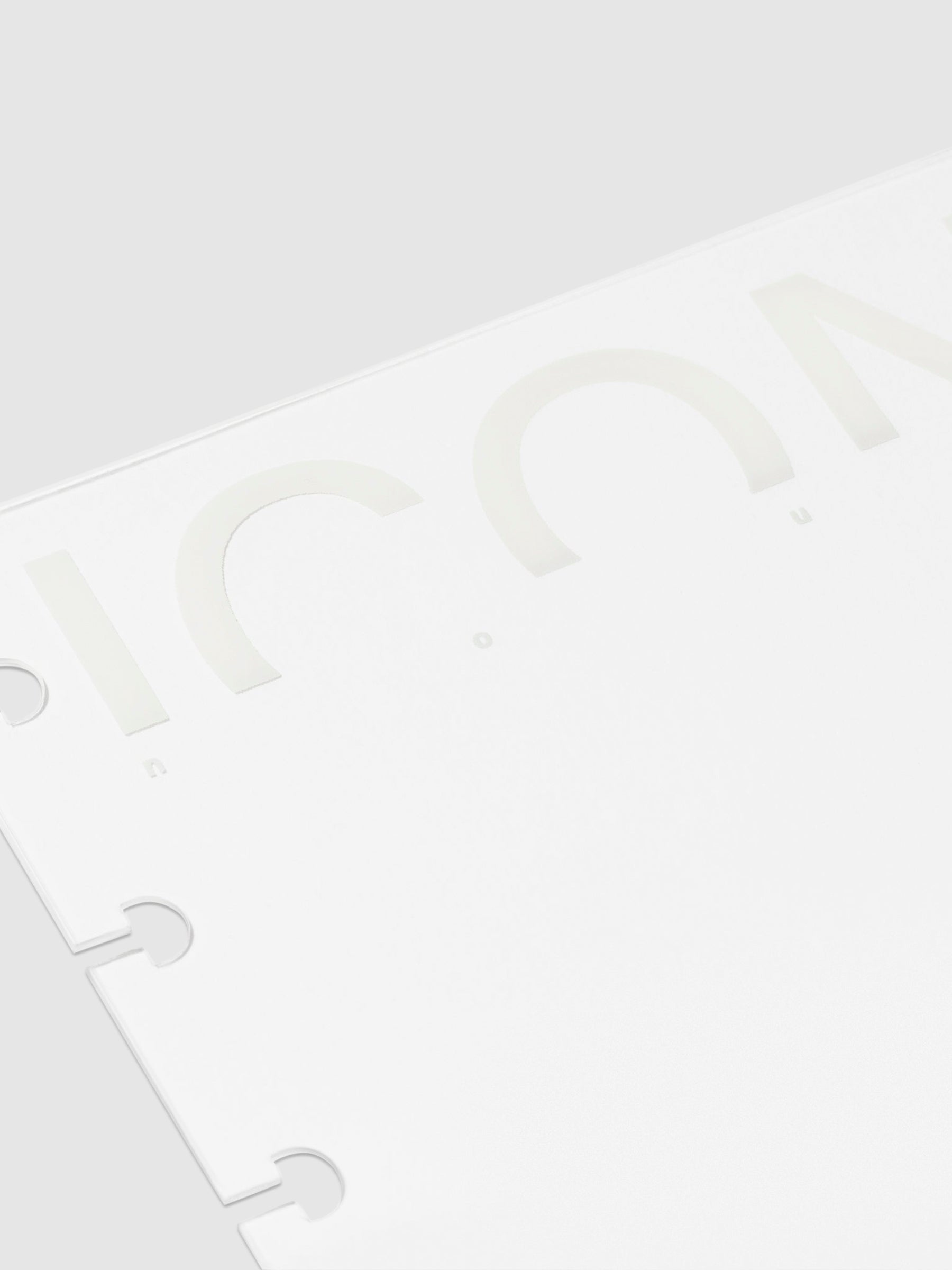 Closeup of cover - text reads "icon."