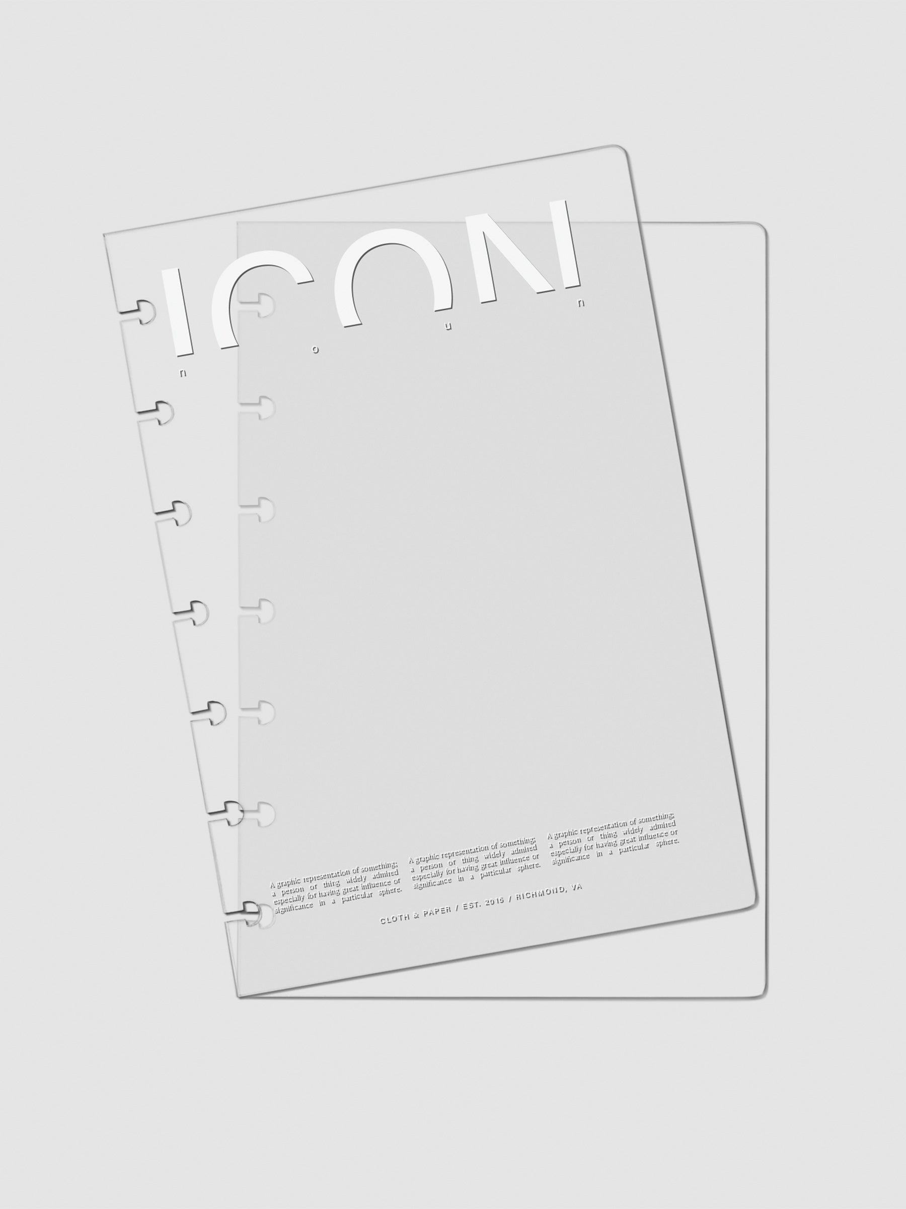 Two Crystal Clear Discbound Notebook Covers Icon laid on top of one another with the top cover tilted slightly to the left.
