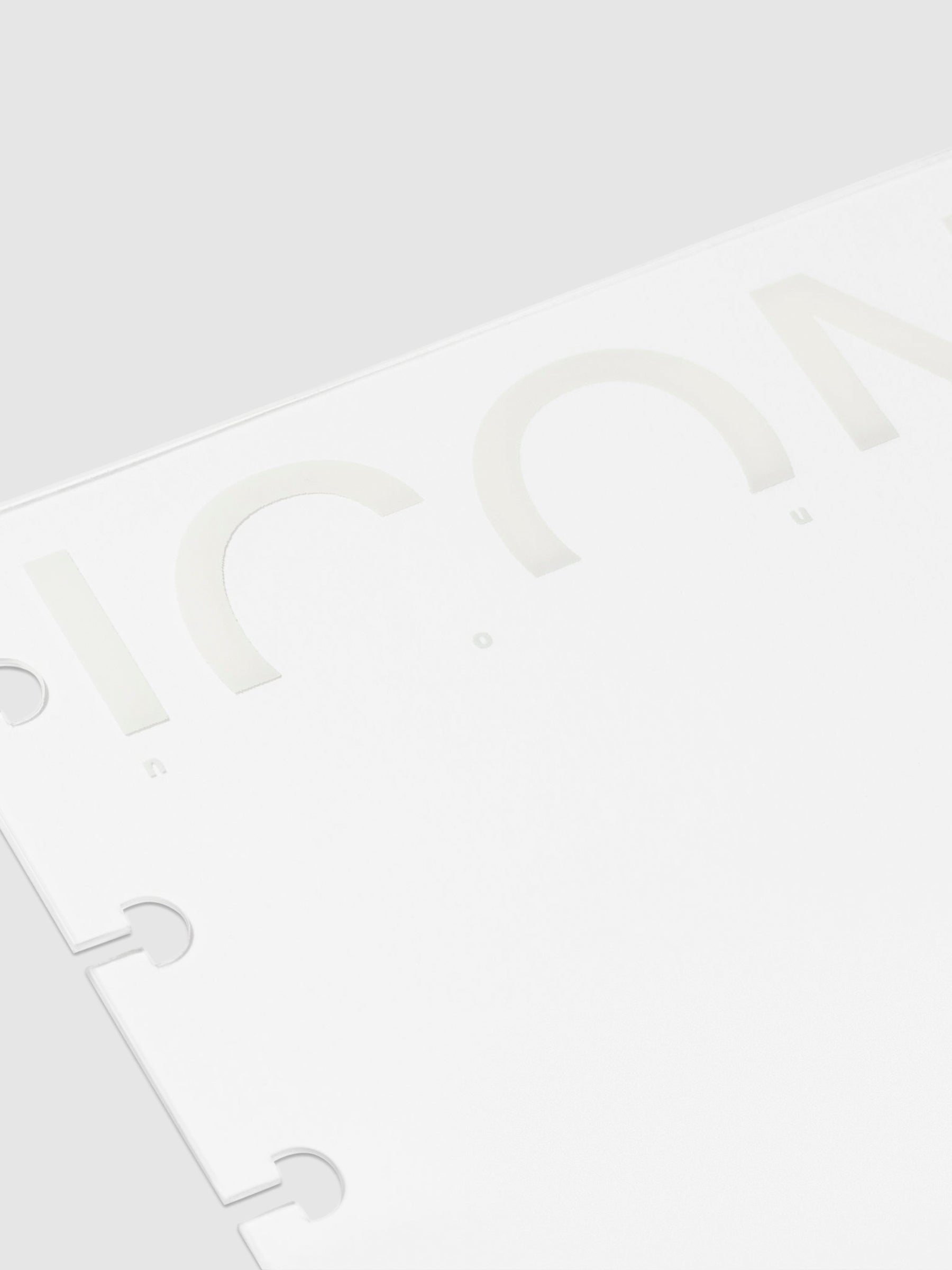 Closeup of cover - text reads "icon."