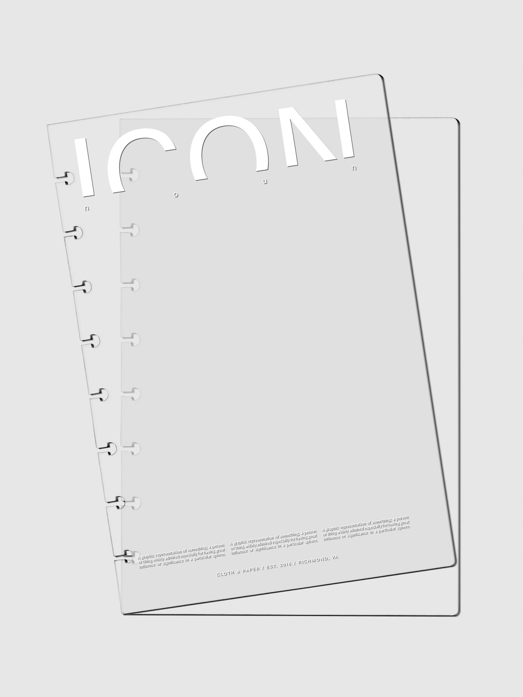 Two Crystal Clear Discbound Notebook Covers Icon laid on top of one another with the top cover tilted slightly to the left.