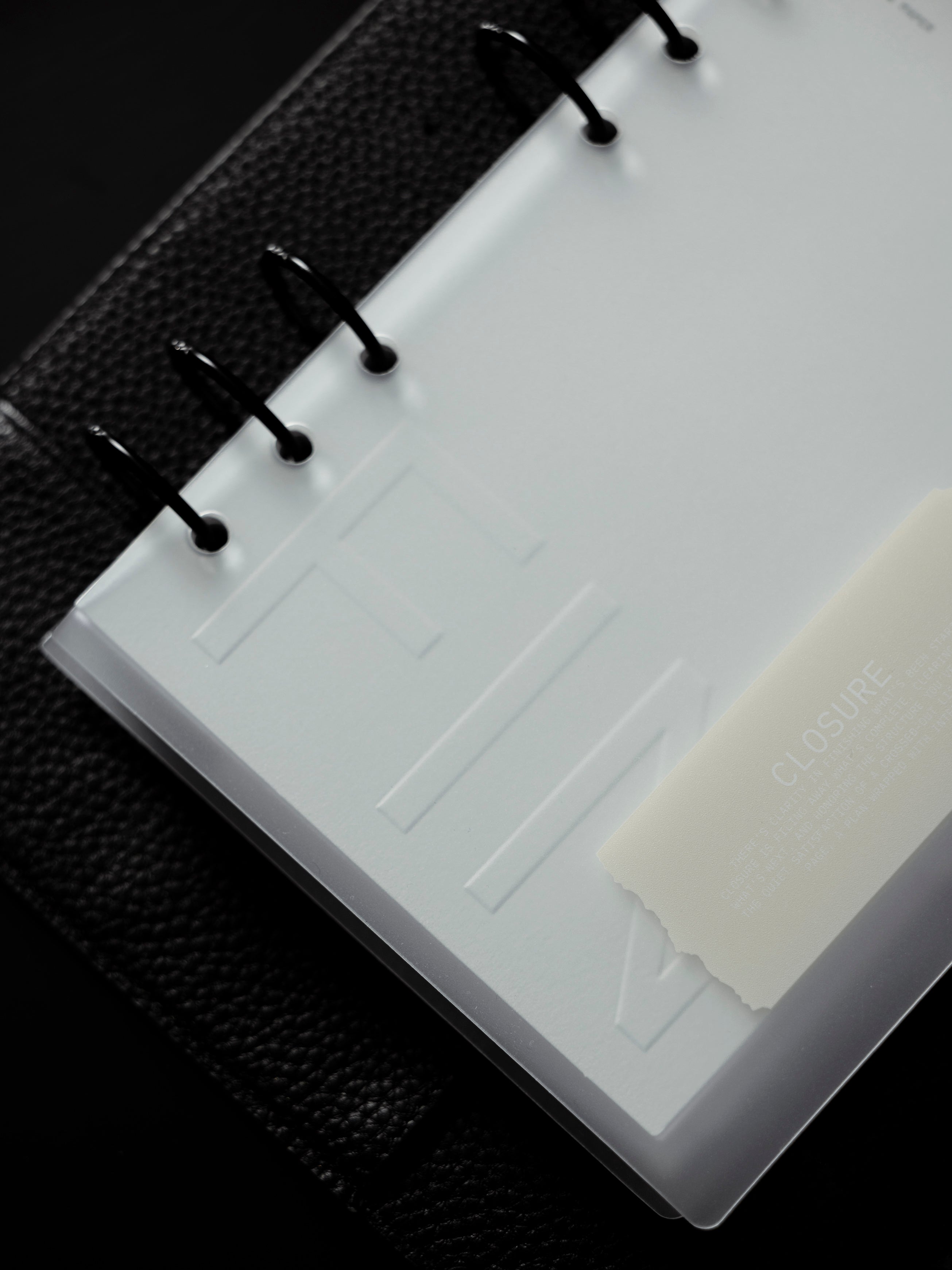 Close up of Closure Planner Dashboard + Cover Set against a black background.