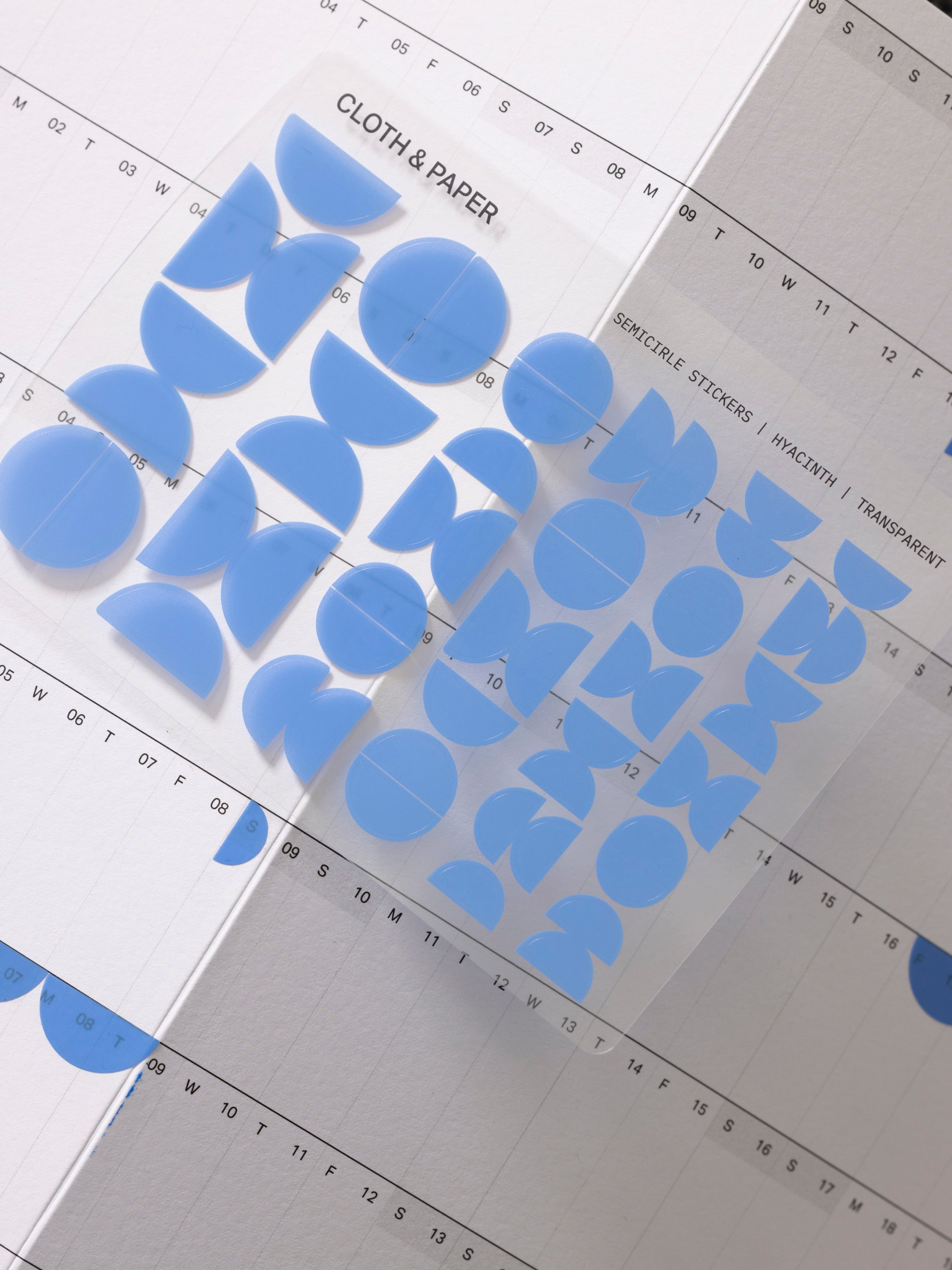 Semicircle Sticker Set on top of an insert.