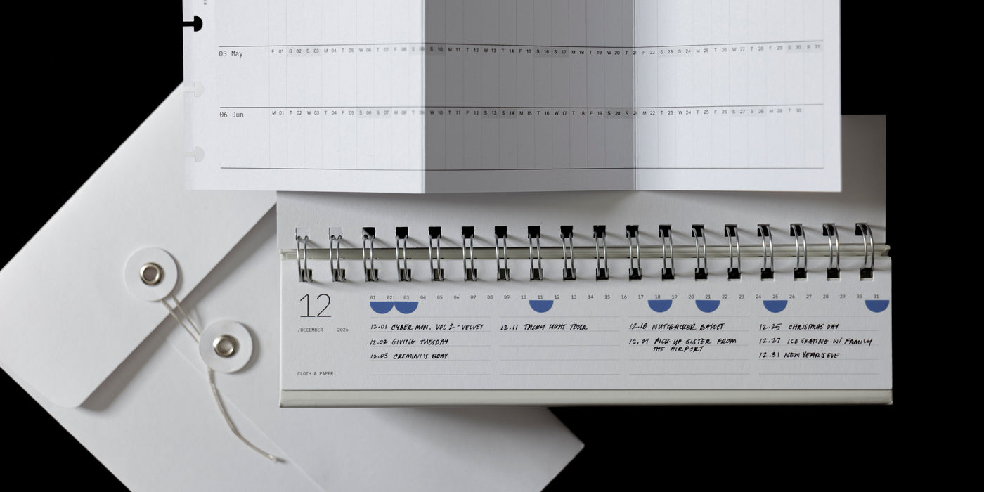 a spiral bound calendar with a spiral bound calendar