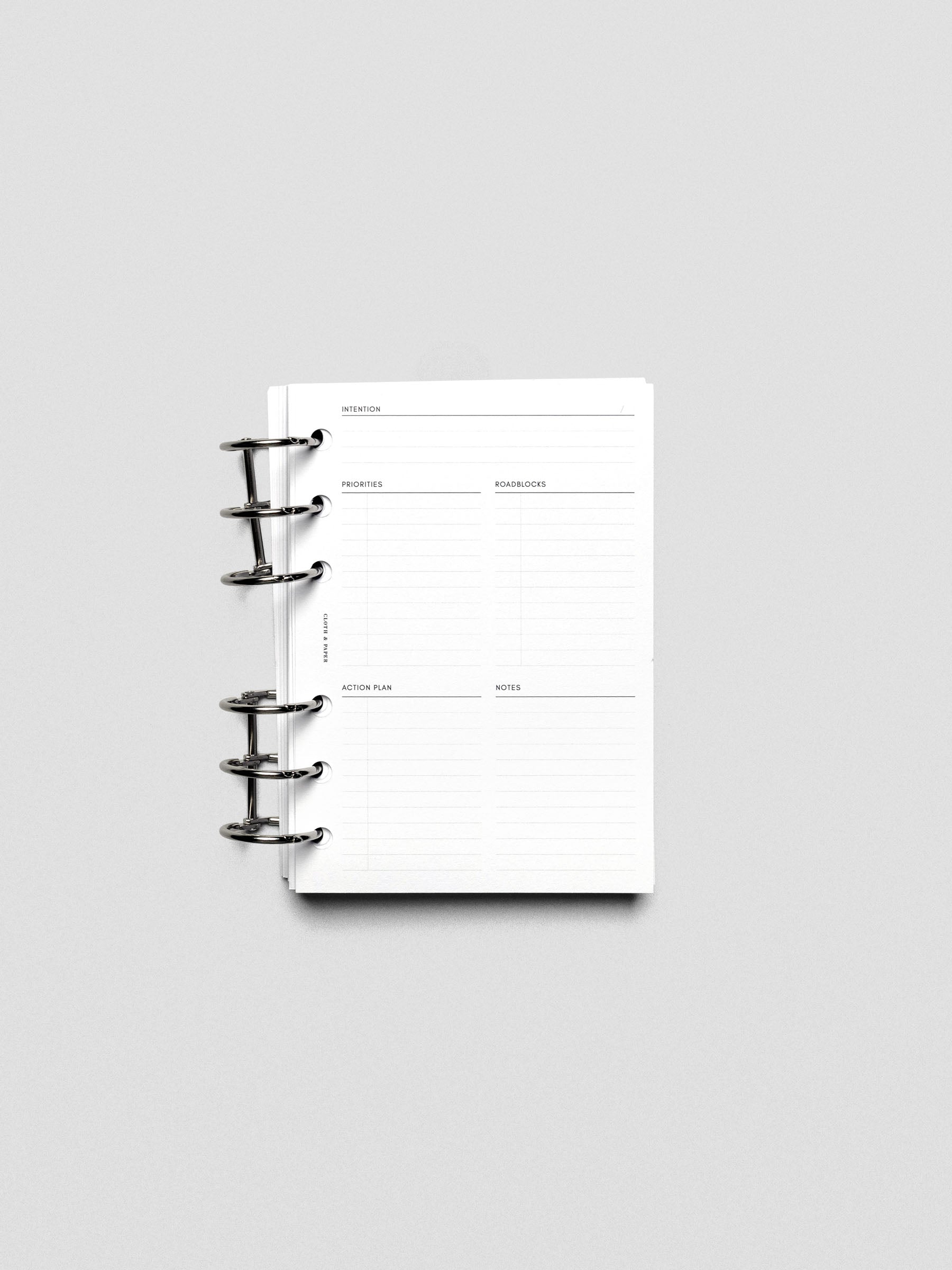 Daily Intention Planner Inserts show blank in A6 size ring bound.