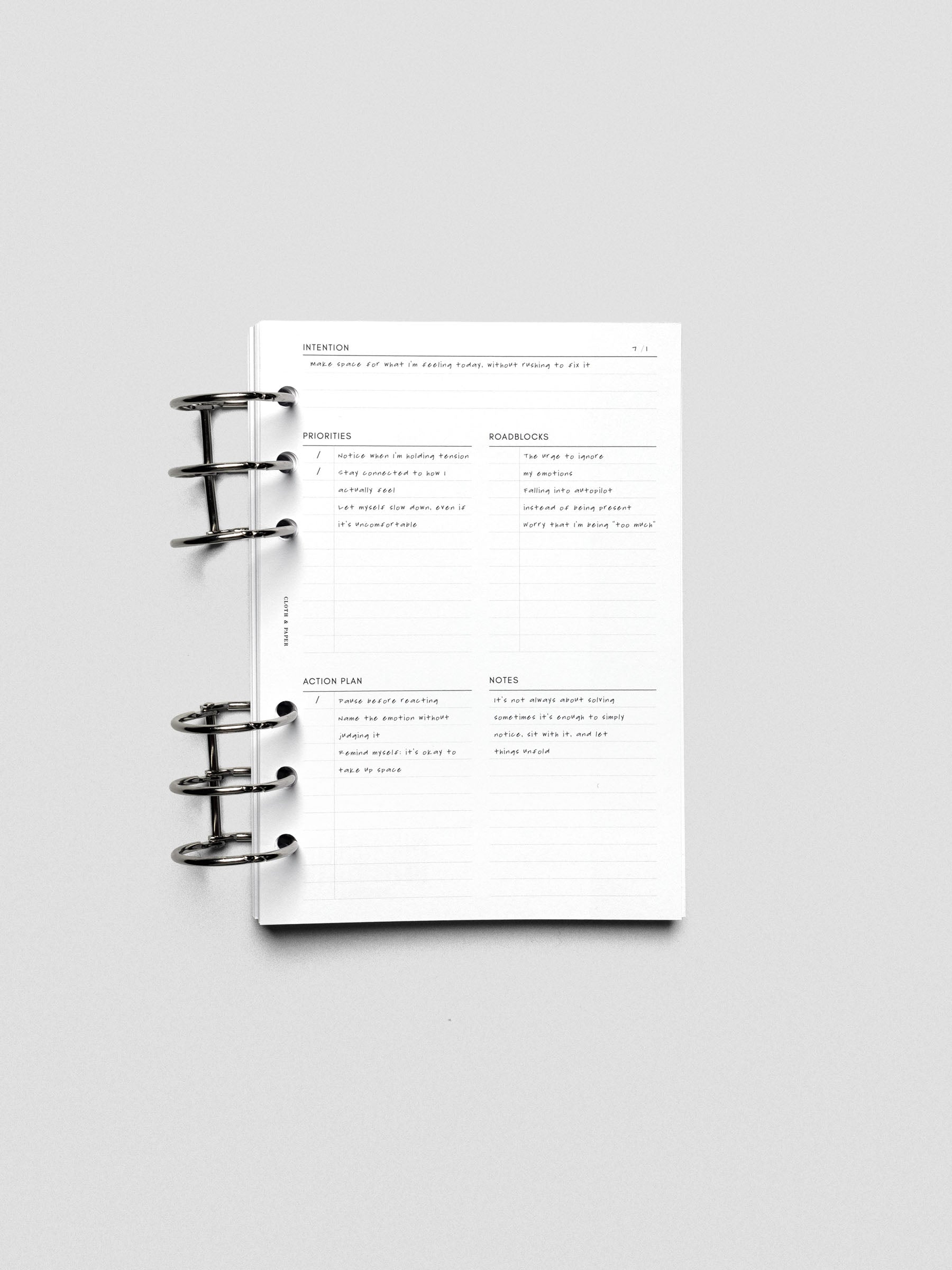 Daily Intention Planner Inserts show filled out in Personal Wide size ring bound.