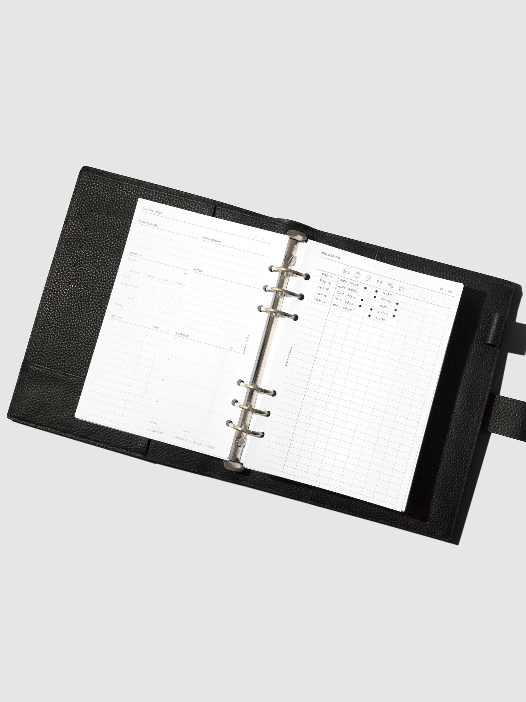 Inserts shown in use inside a leather planner. Size shown is A5.