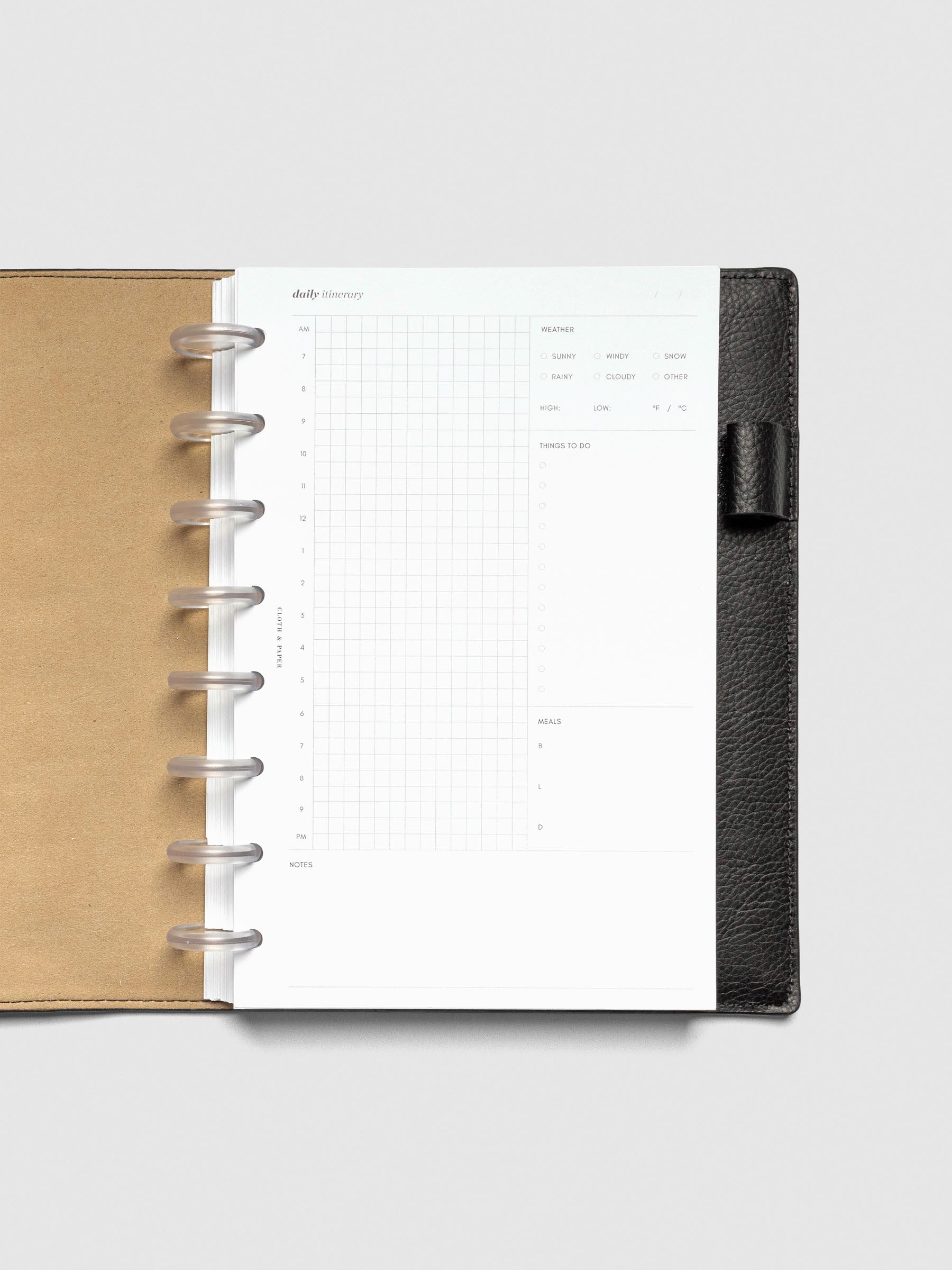 Insert in use inside a black leather folio.