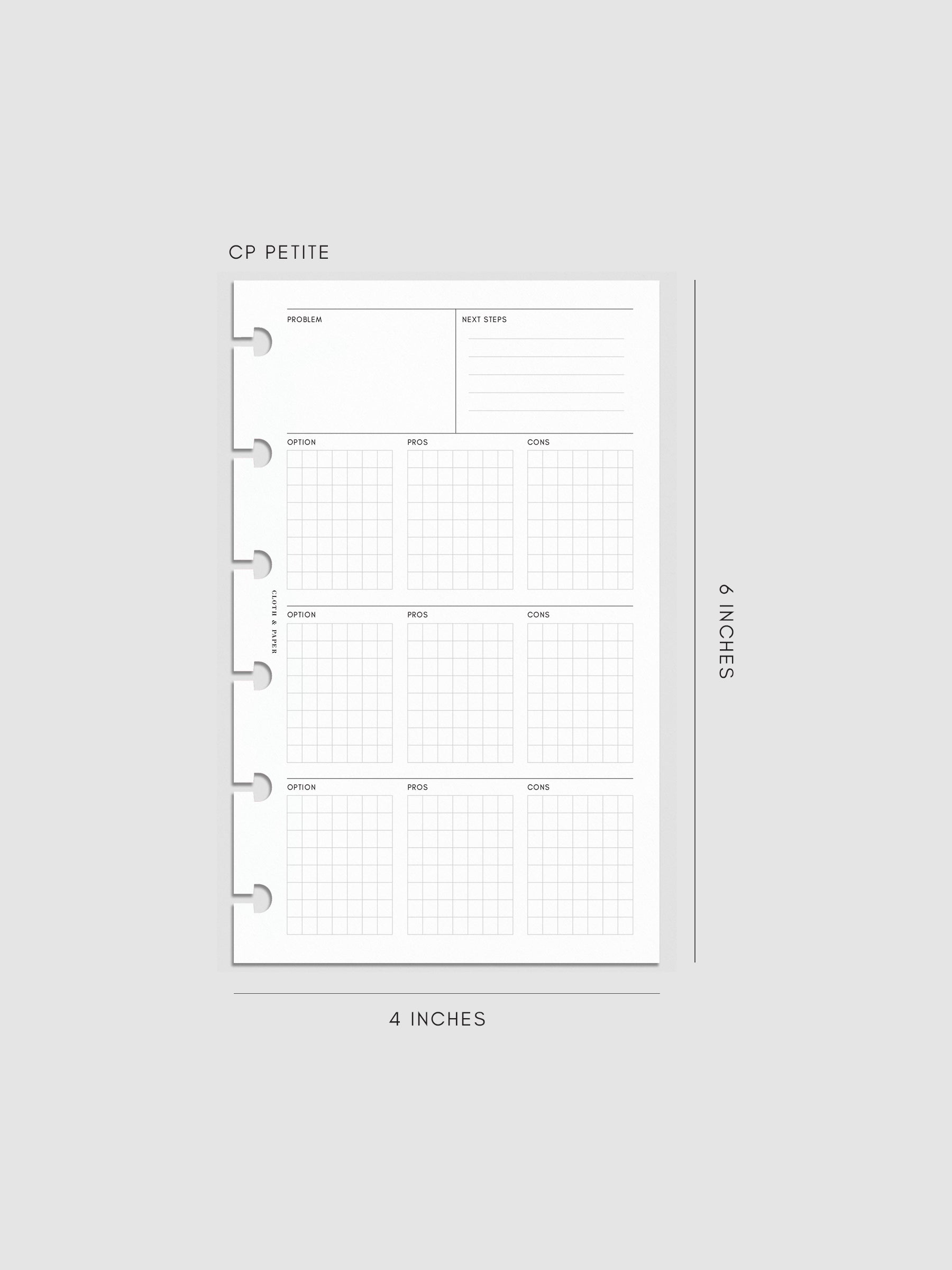 CP Petite decision-making insert measuring 4 by 6 inches. The page includes structured sections for problem, next steps, and gridded boxes for options, pros, and cons, with disc-bound punches on the side.