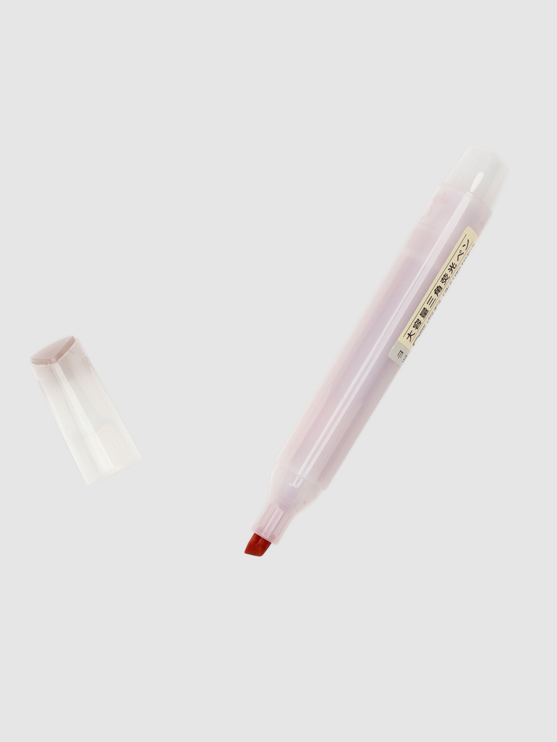 Dianshi Triangle Highlighter in Light Retro Series uncapped with cap displayed next to the highlighter.