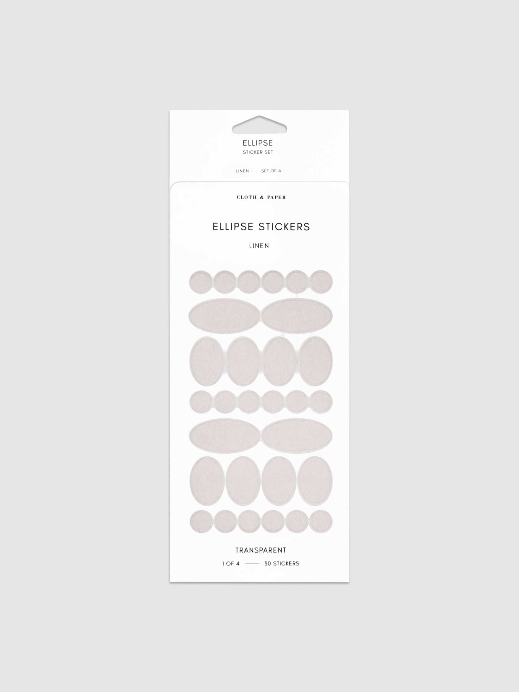 Linen stickers in their packaging on a neutral background.
