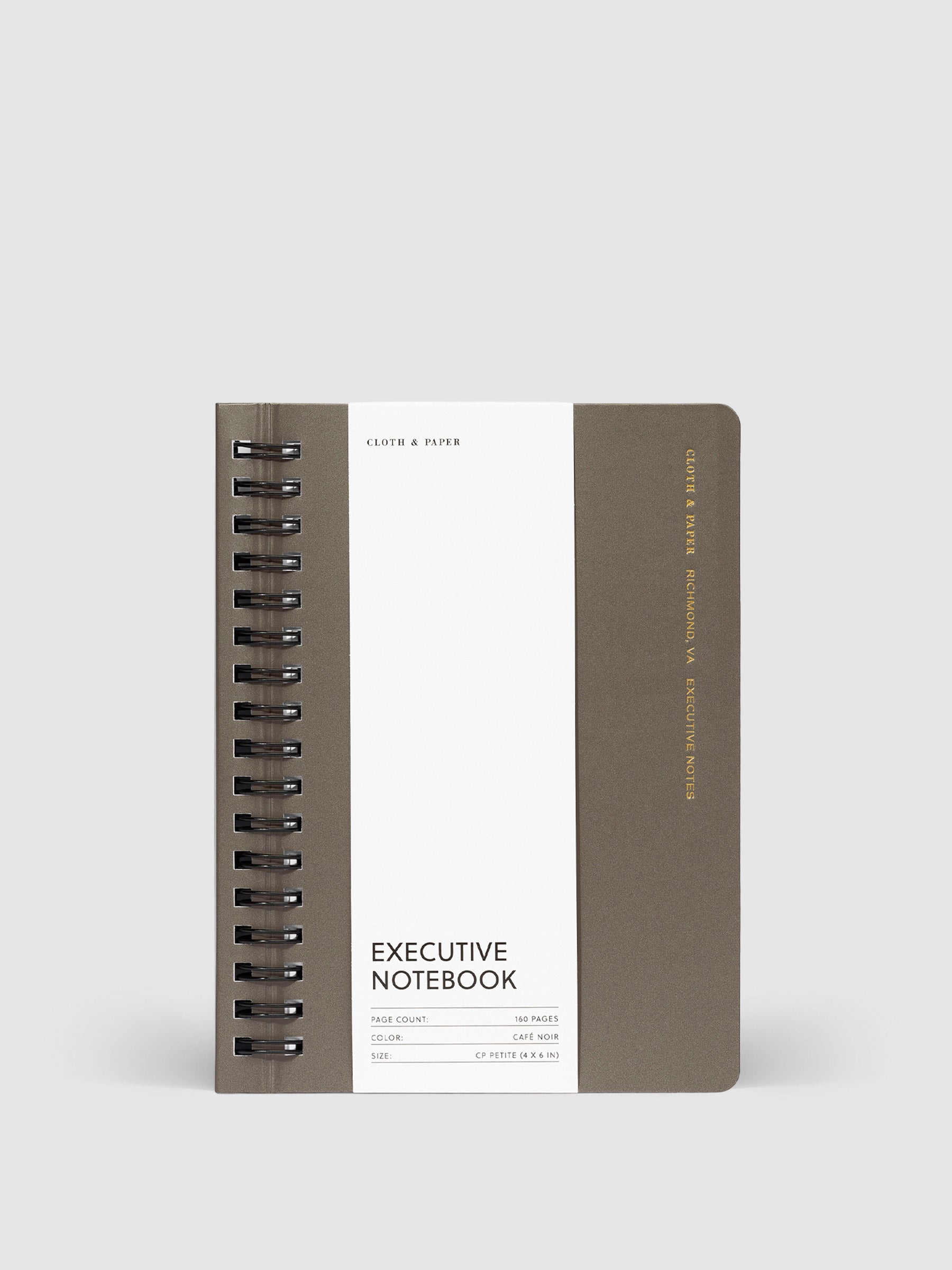 Cafe Noir notebook displayed with its packaging on a neutral background.