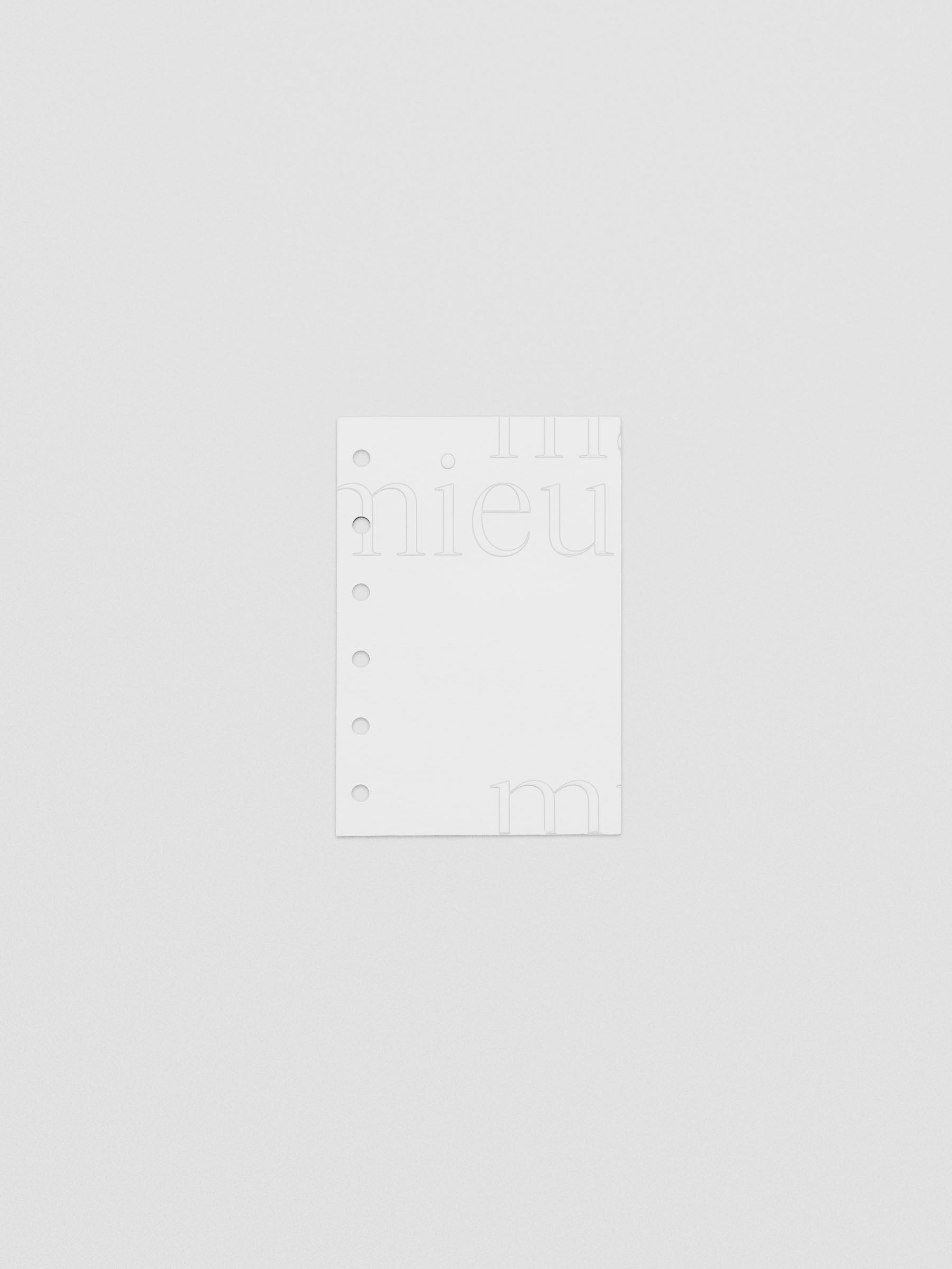 Essentialism Dashboard Duo reading "moins mai mieux" in size Pocket; cardstock layer only.